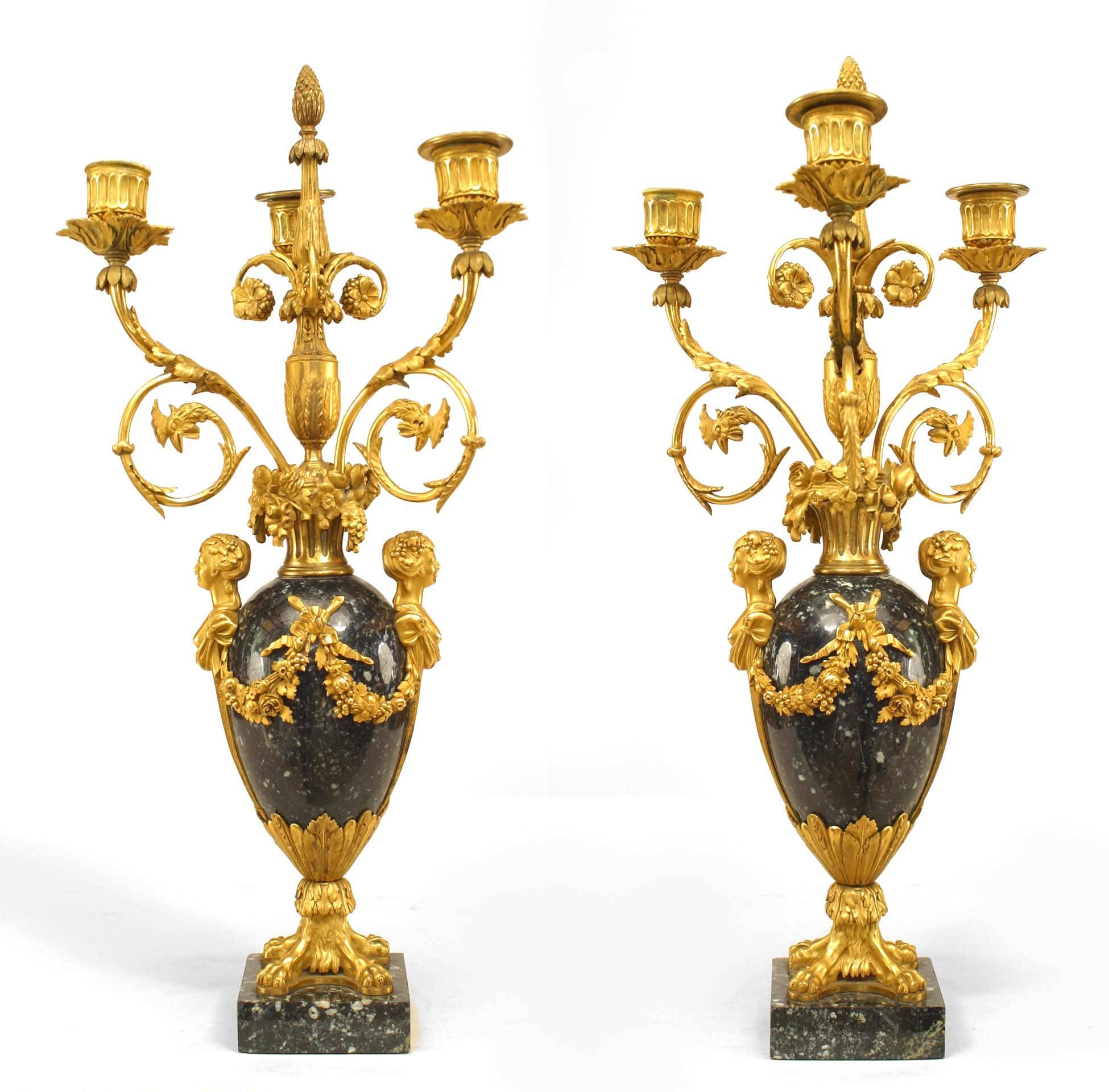 Pair of French Victorian (19th Century) black marble and gilt bronze trim 3-light candelabras with extensive floral and swag design & lion paw details (signed: HENRY DASSON 1879) (PRICED AS Pair)
