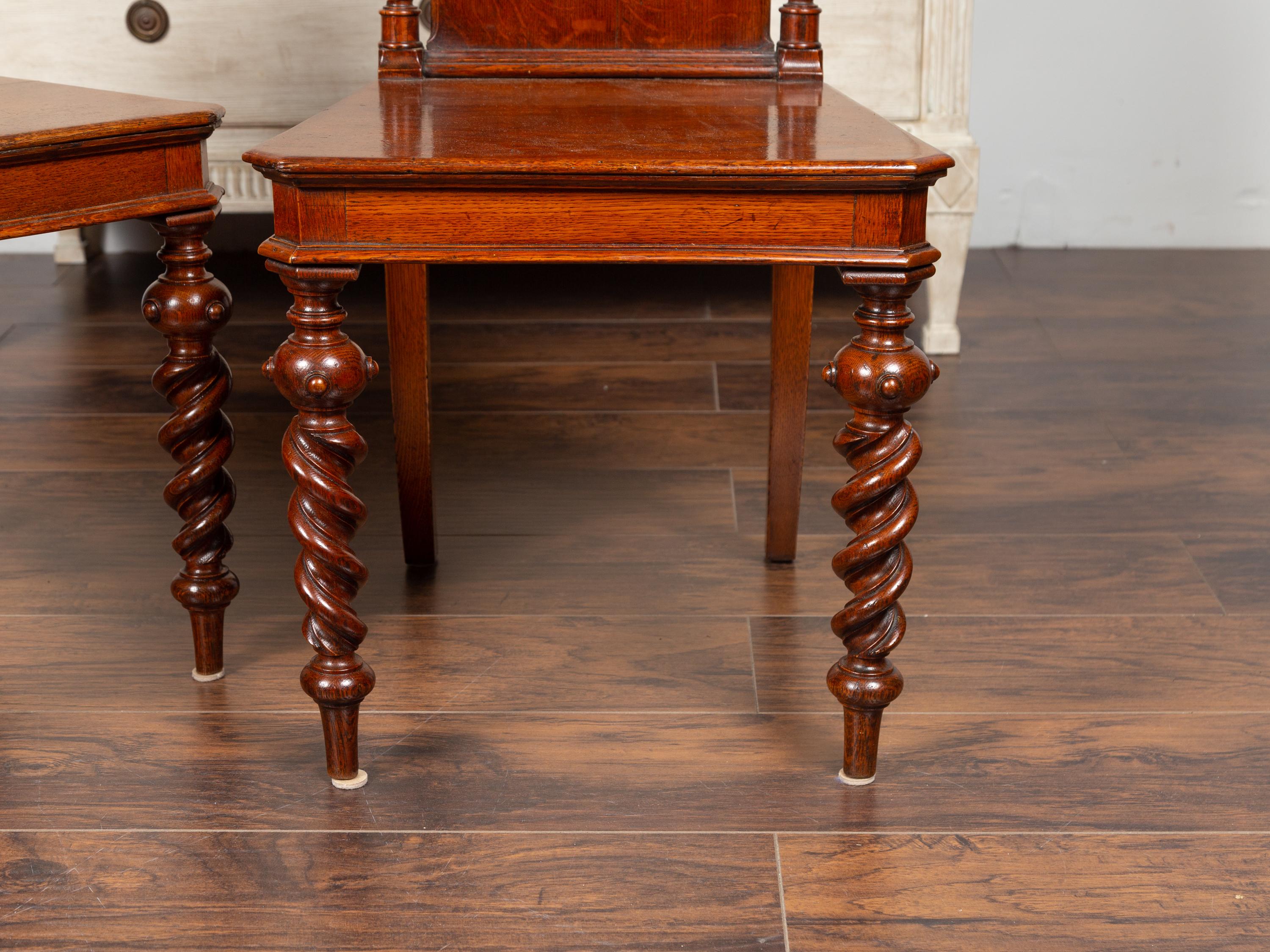 Pair of 1880s English Barley Twist Oak Hall Chairs with Foliage and Acorn Motifs 1