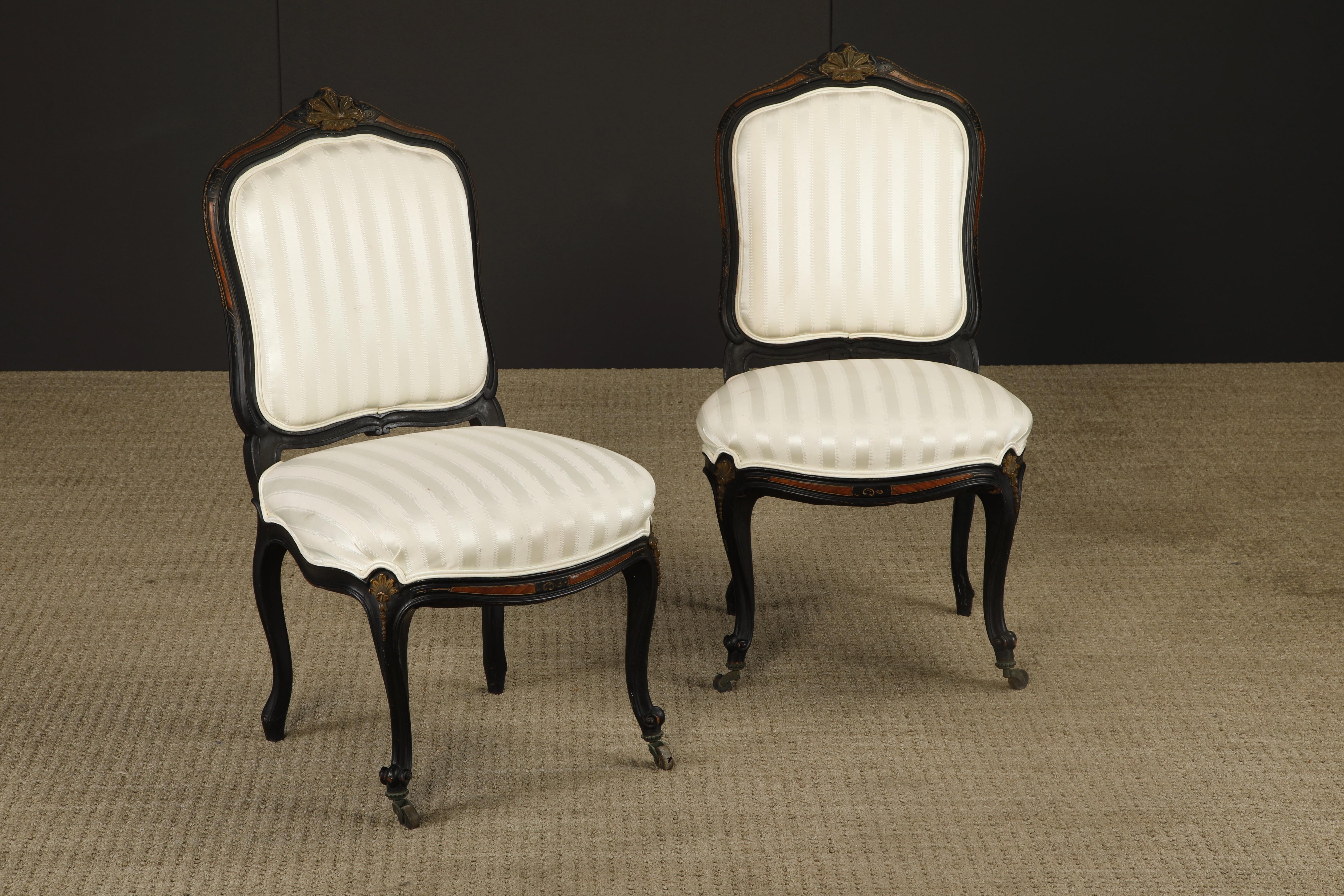 Late 19th Century Pair of 1890s French Louis XV Carved, Gilt, Ebonized, and Upholstered Chairs For Sale