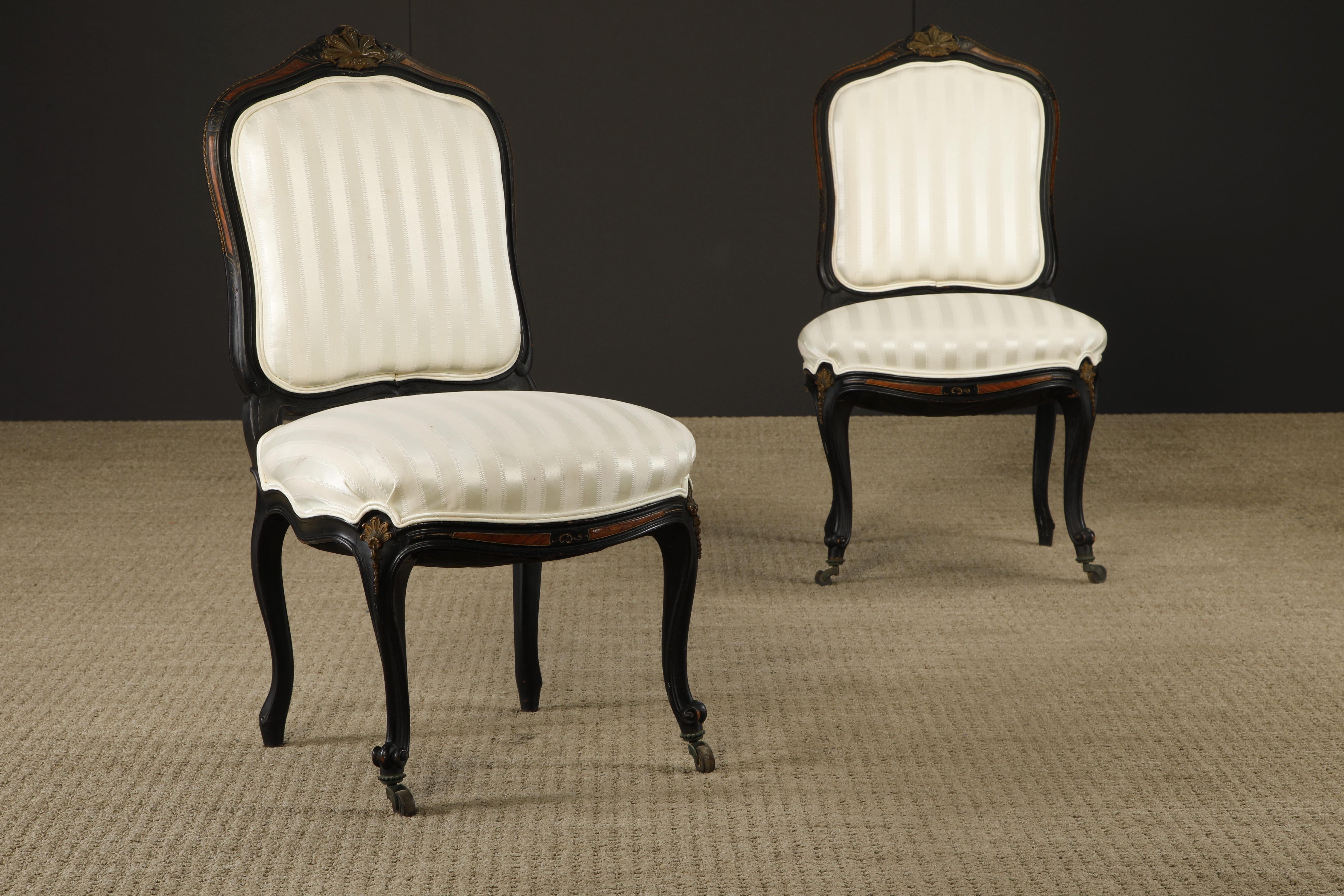 Wood Pair of 1890s French Louis XV Carved, Gilt, Ebonized, and Upholstered Chairs For Sale