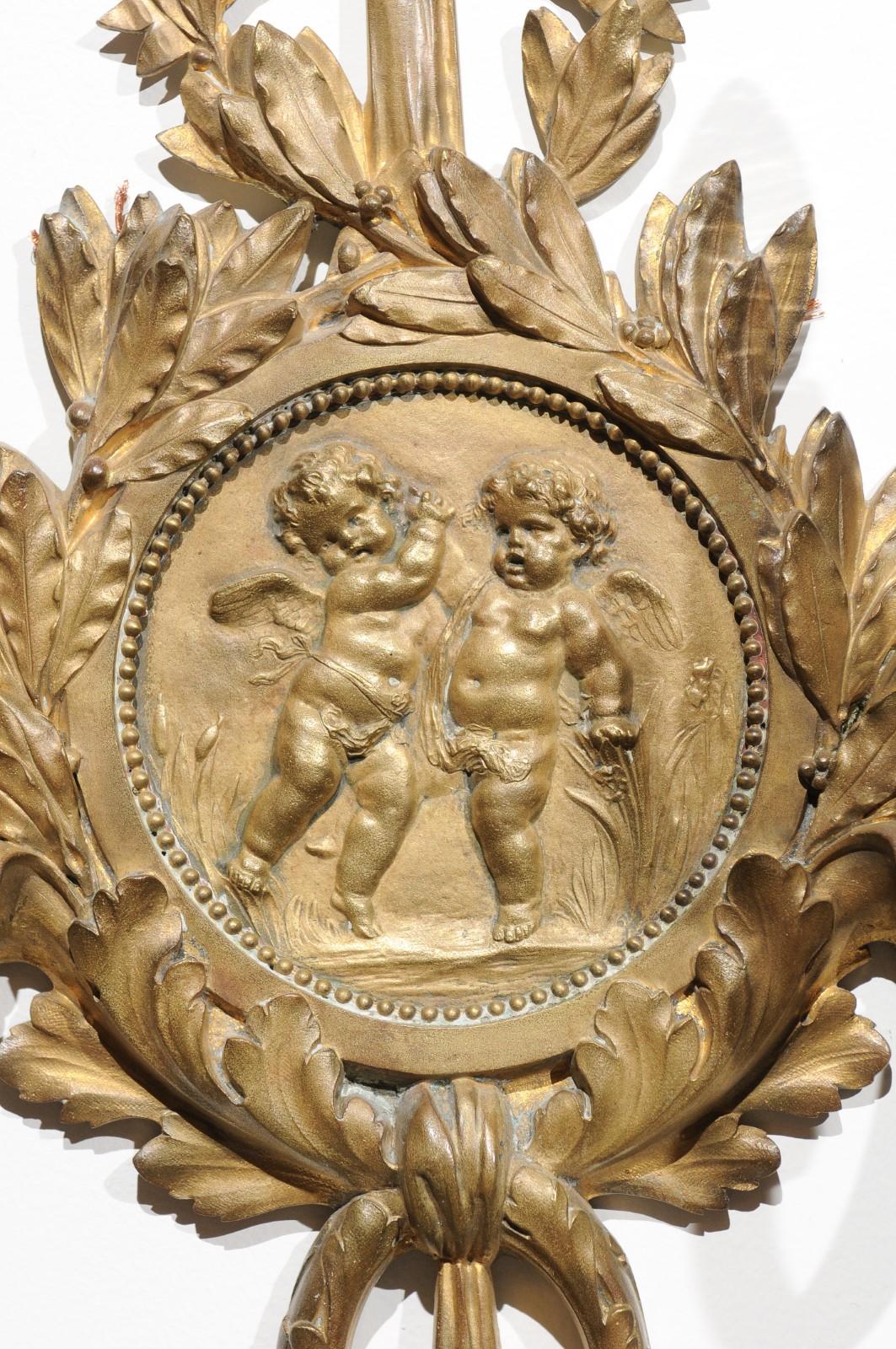 19th Century Pair of 1890s French Two-Light Brass Sconces with Ribbon, Cherubs and Satyrs For Sale
