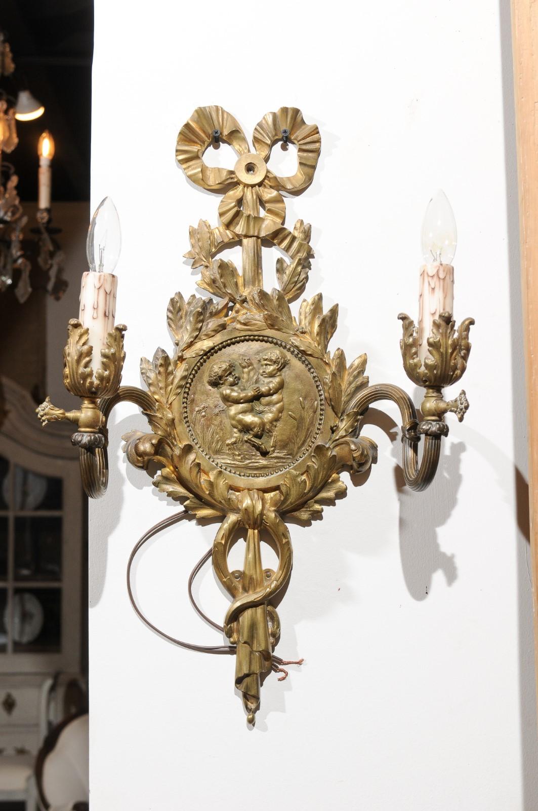 Pair of 1890s French Two-Light Brass Sconces with Ribbon, Cherubs and Satyrs For Sale 4