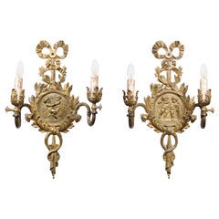 Antique Pair of 1890s French Two-Light Brass Sconces with Ribbon, Cherubs and Satyrs