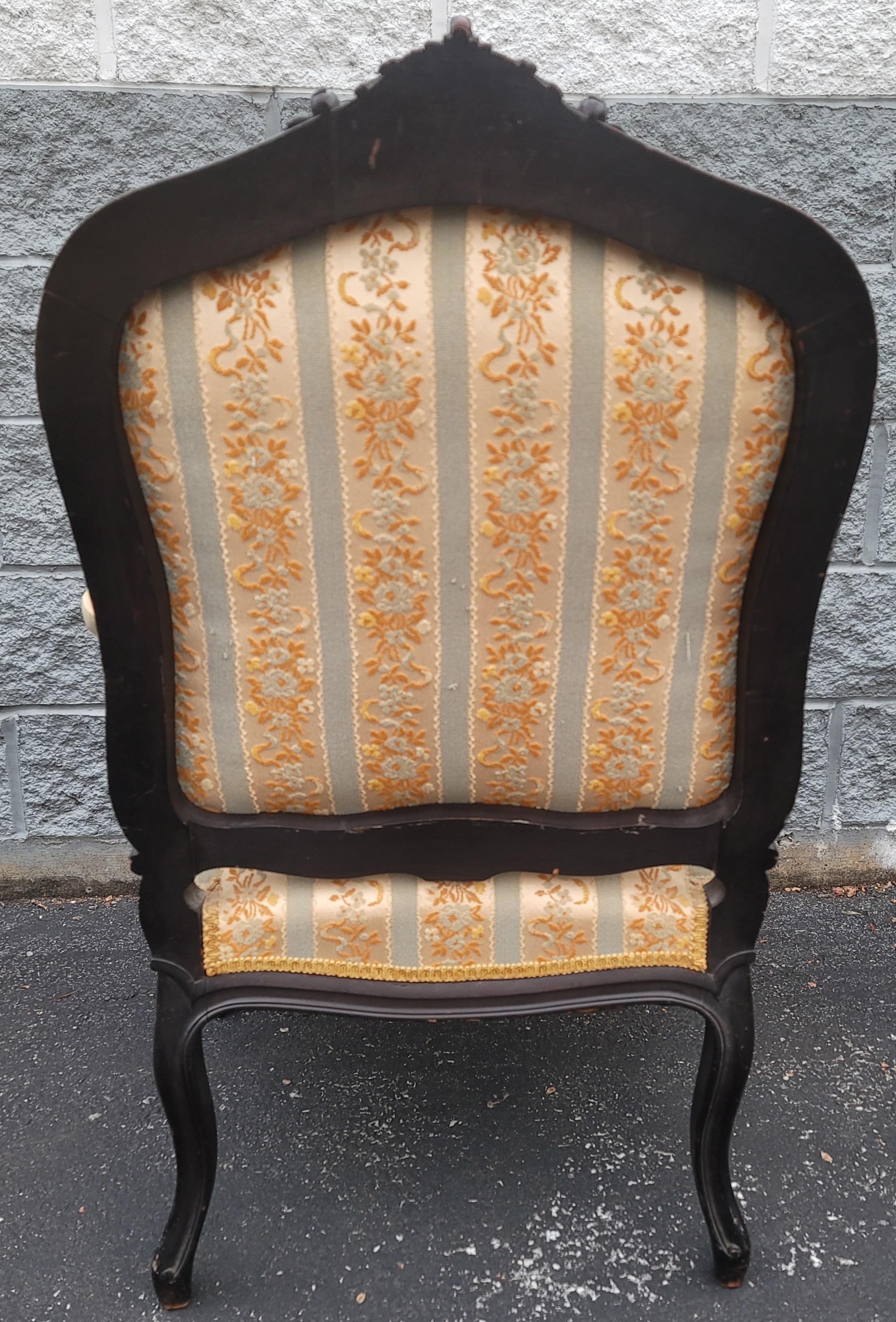 French Pair of  1890s Louis XV Carved, Ebonized and Upholstered Bergere  Arm Chairs For Sale