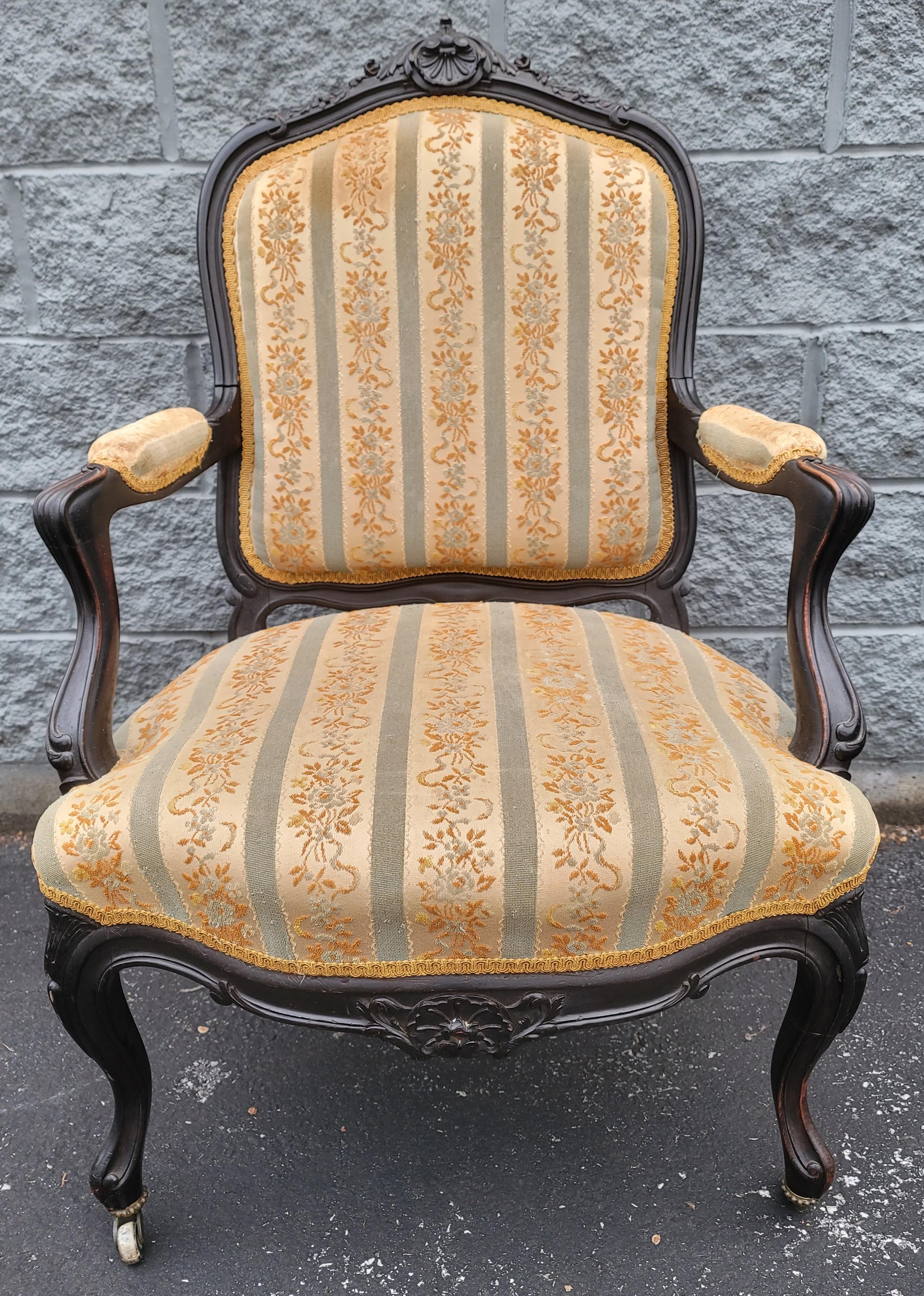 Upholstery Pair of  1890s Louis XV Carved, Ebonized and Upholstered Bergere  Arm Chairs For Sale