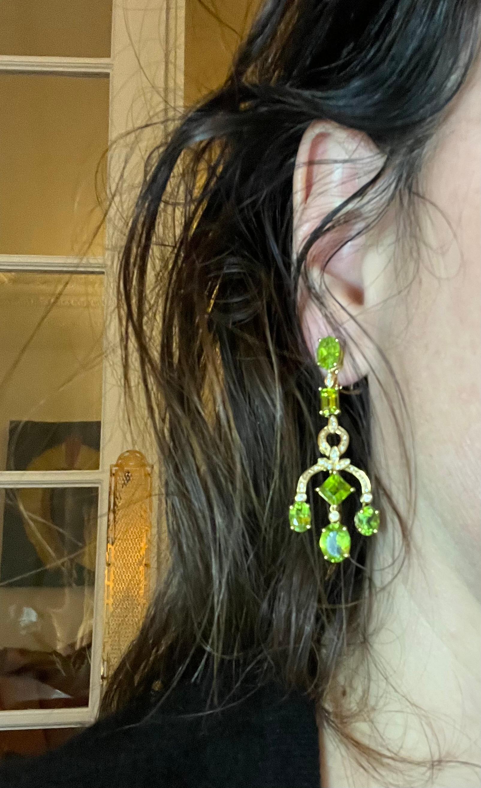 Rare pair of 18 carat gold earrings set with magnificent peridots and brilliants in pavé
model 