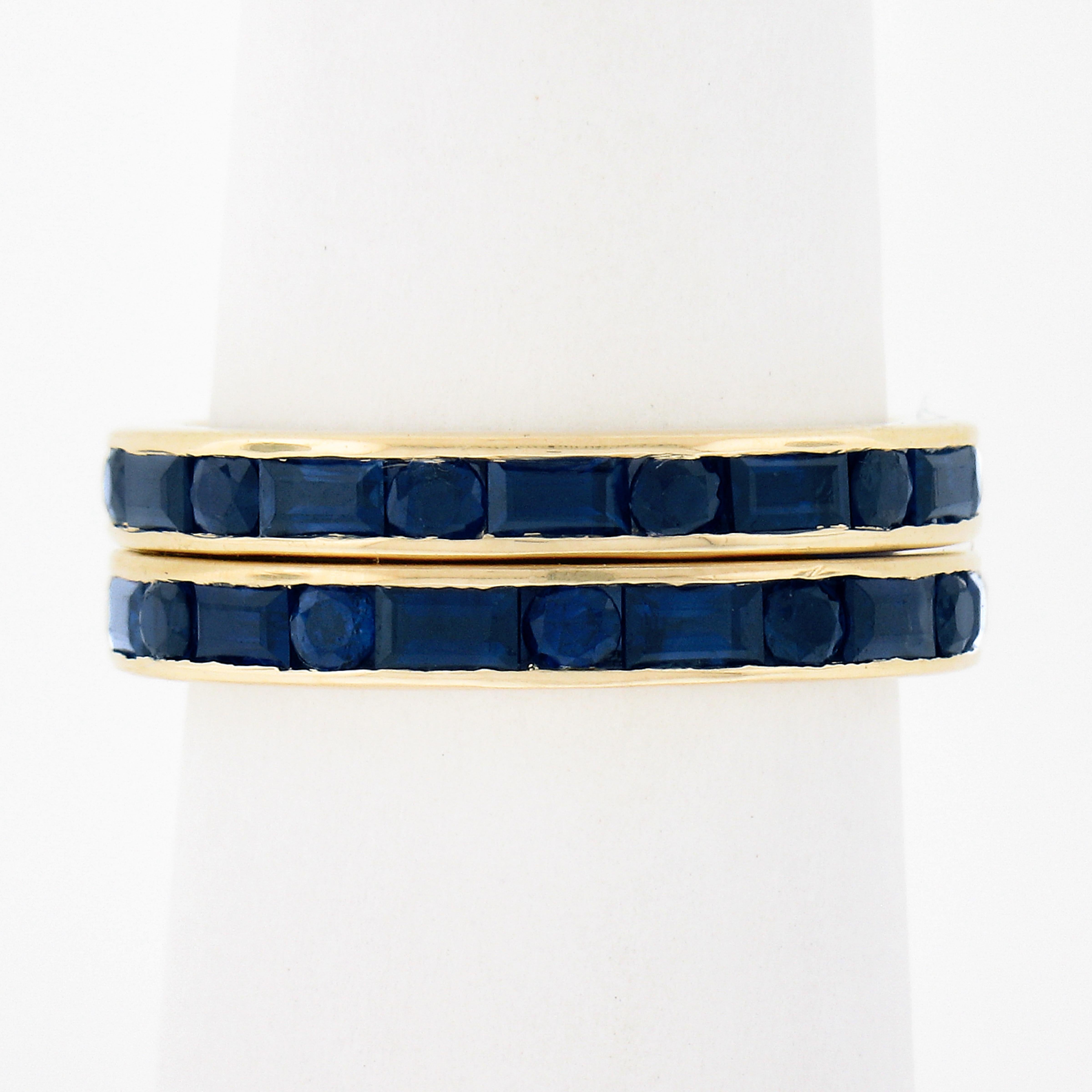 This wonderful and stylish pair of sapphire guard bands is crafted in solid 18k yellow gold with each band featuring round and rectangular cut true royal blue color sapphires, totaling approximately 4.40 carats and perfectly channel set throughout