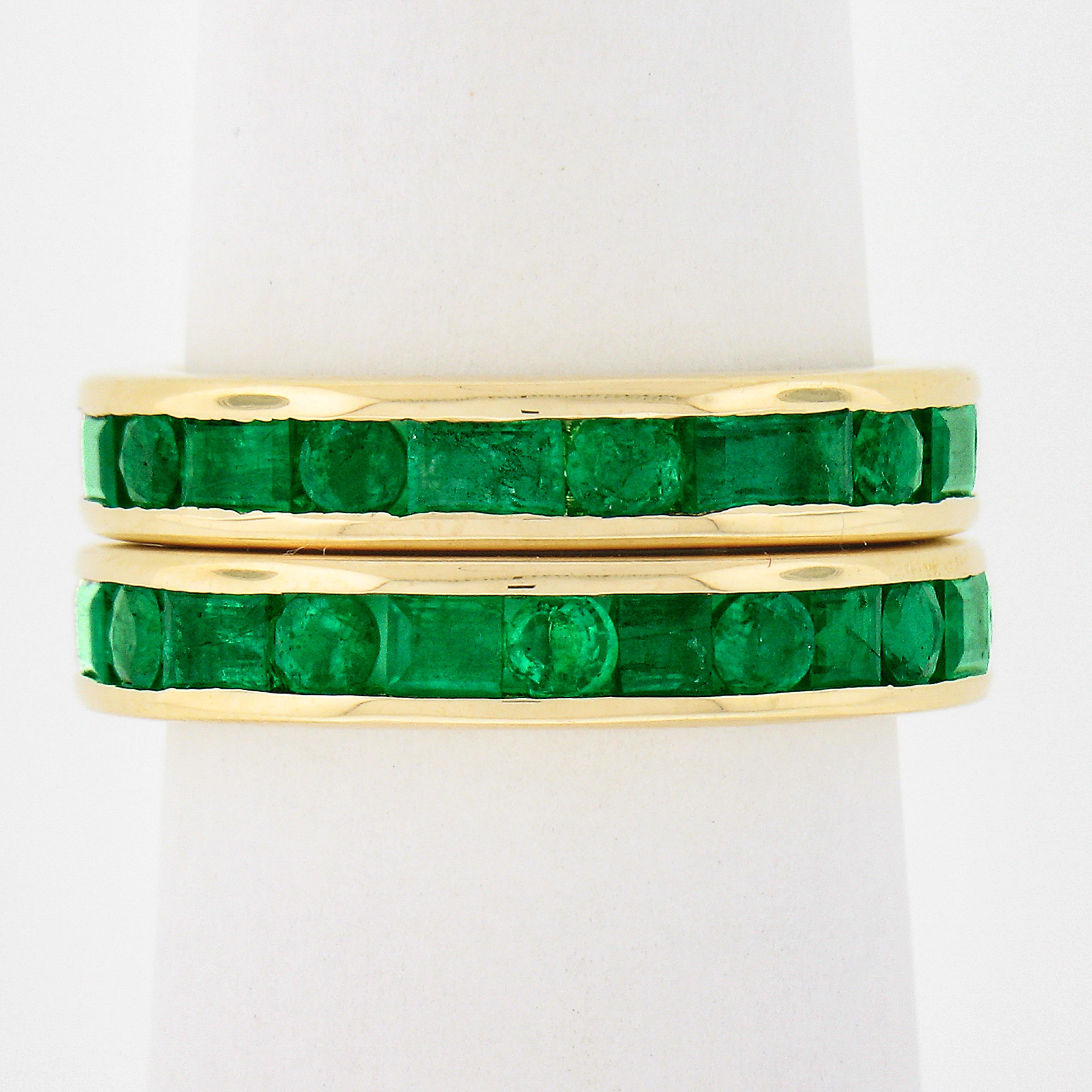 This beautiful pair of emerald guard bands are crafted in solid 18k yellow gold with each band featuring round, square and rectangular cut natural emeralds totaling approximately 4.60 carats. These emeralds display slightly varying happy and rich