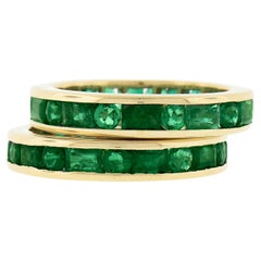Pair of 18k Gold 4.60ctw Channel Set GIA Emerald Eternity Stack Band Guard Rings