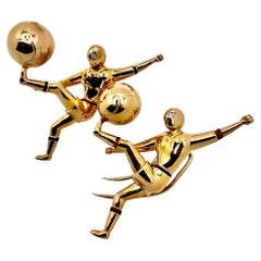 Pair of 18K Gold Soccer Player Pins with Diamond Eyes by Designer Ventrella