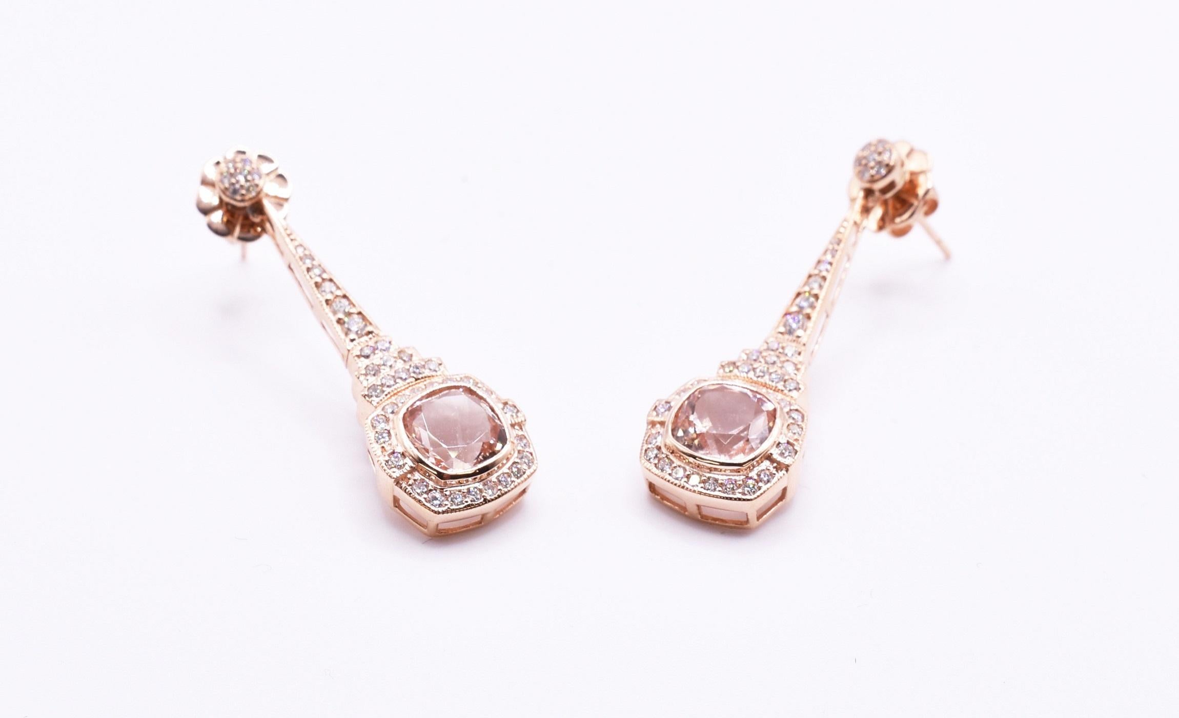 For sale is a lovely pair of Art Deco style 18k rose gold morganite & diamond drop earrings. Featuring a cushion cut morganite to the centre, surrounded by round cut diamonds. Morganite = 3.24ct Diamonds = 0.82ct Gold weight = 9.96g.