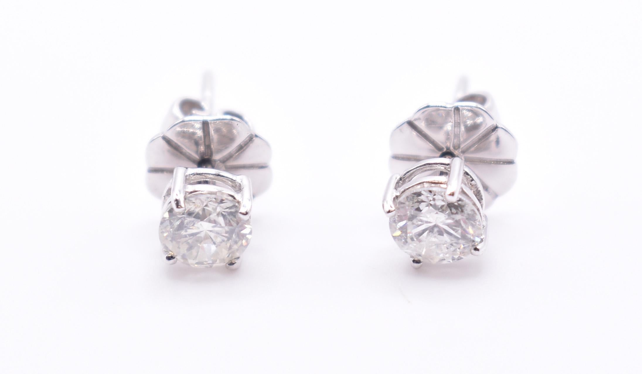 For sale is a lovely pair of 18k white gold 1.23ct diamond stud earrings.

Metal: 18K White Gold
Total Carat Weight: 1.23ct