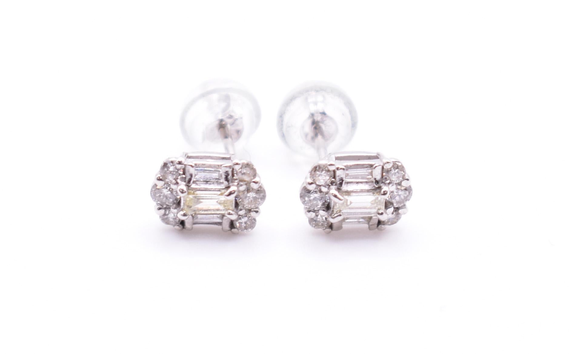 Baguette Cut Pair of 18k White Gold Diamond Earrings For Sale