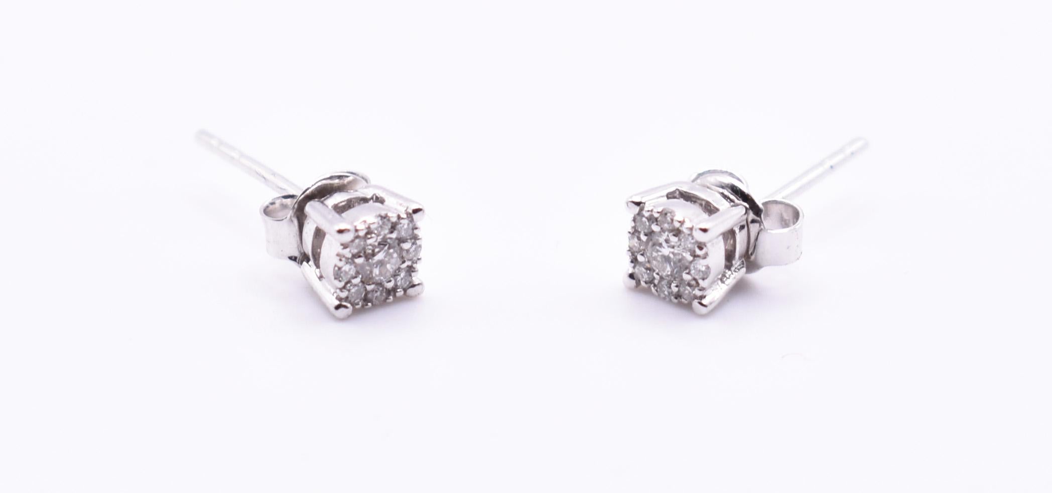 For sale is a lovely pair of 18k white gold illusion diamond stud earrings. Gold = 1.56g. Diamonds = 0.23ct
