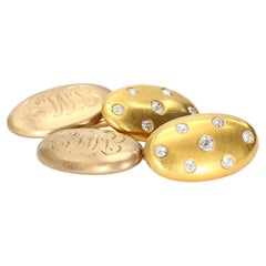 Pair of 18k Yellow Gold Cufflinks with Seven Diamond Accents on each
