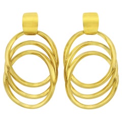 Paire de boucles d'oreilles en or jaune 18 carats avec pendentifs ovales surdimensionnés