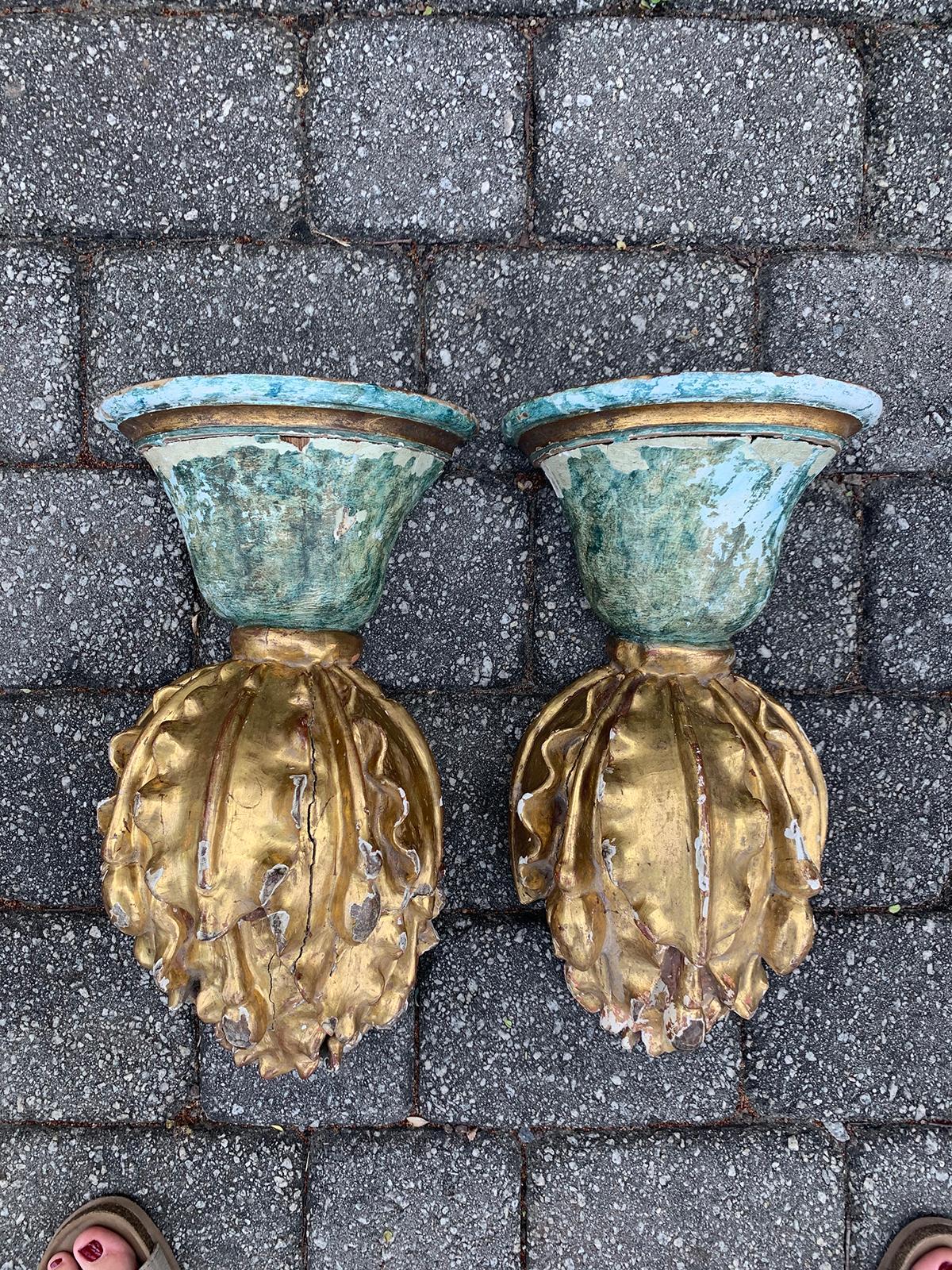 Pair of 18th-19th century giltwood flame brackets or finials.