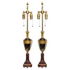 Paire de vases/ampoules d'époque Louis XVI du 18ème siècle en bronze patiné et doré