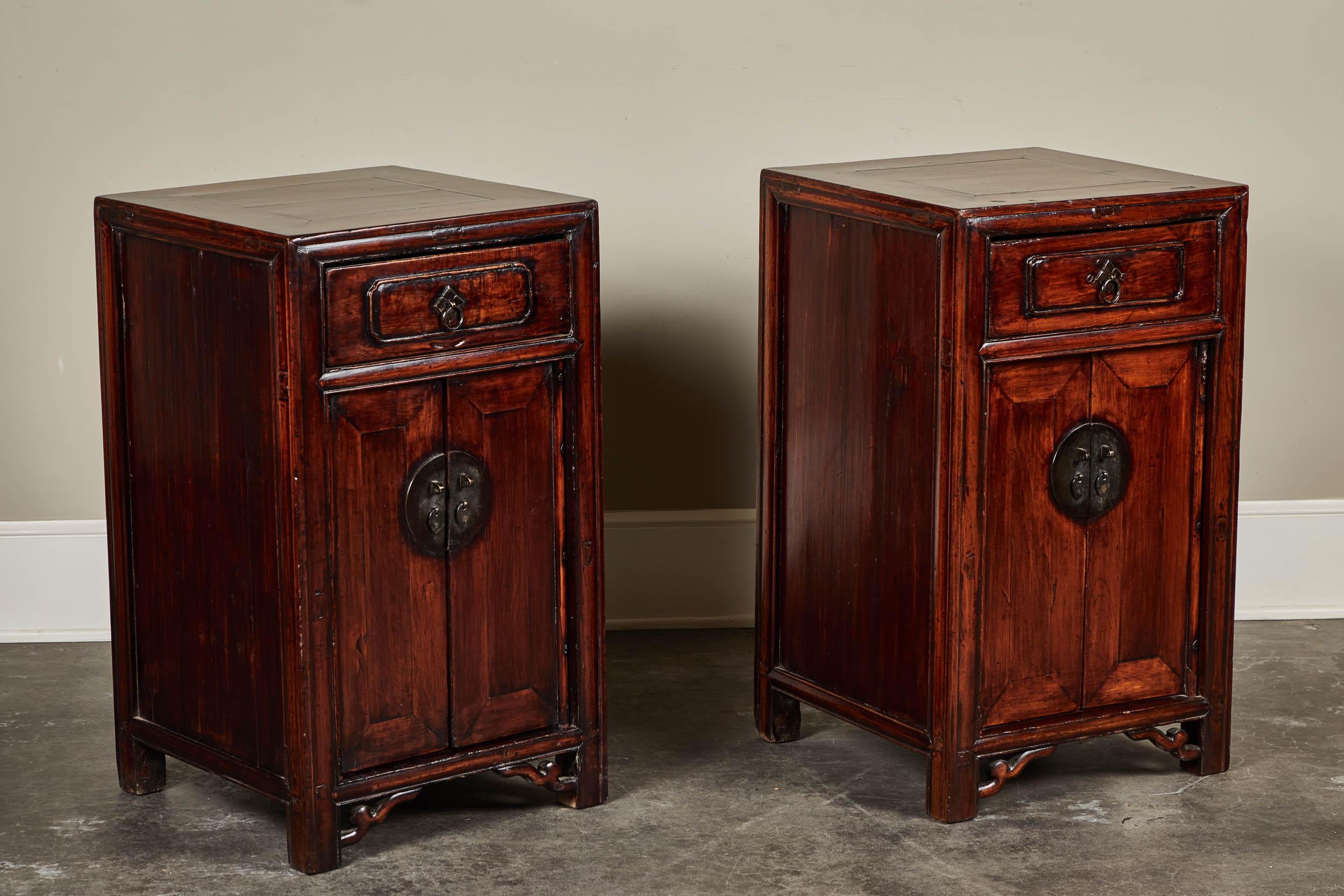 A pair of 18th century elm side cabinets from Shanshi, featuring one drawer and two doors.