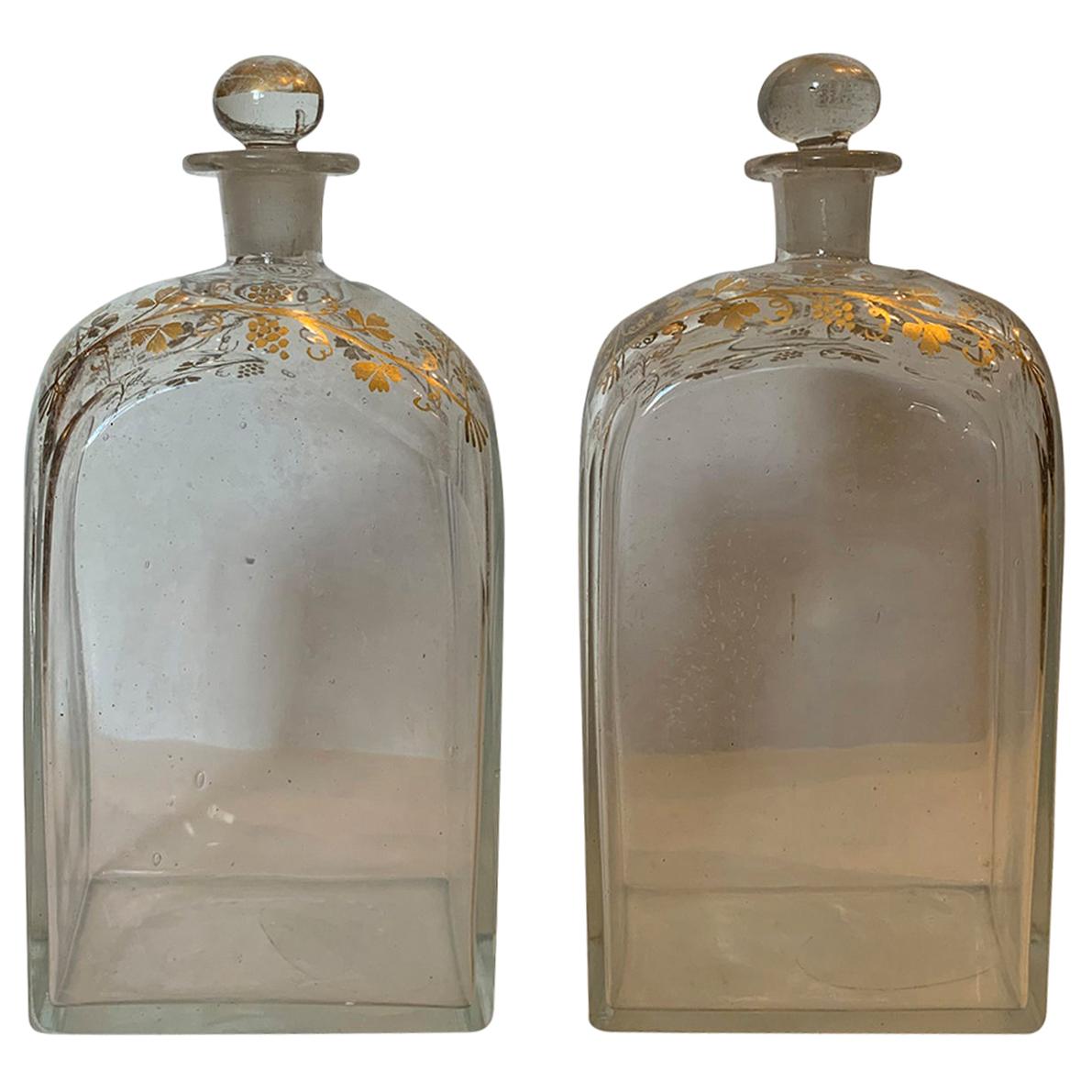 Pair of 18th Century American Glass Decanters with Gilt Details