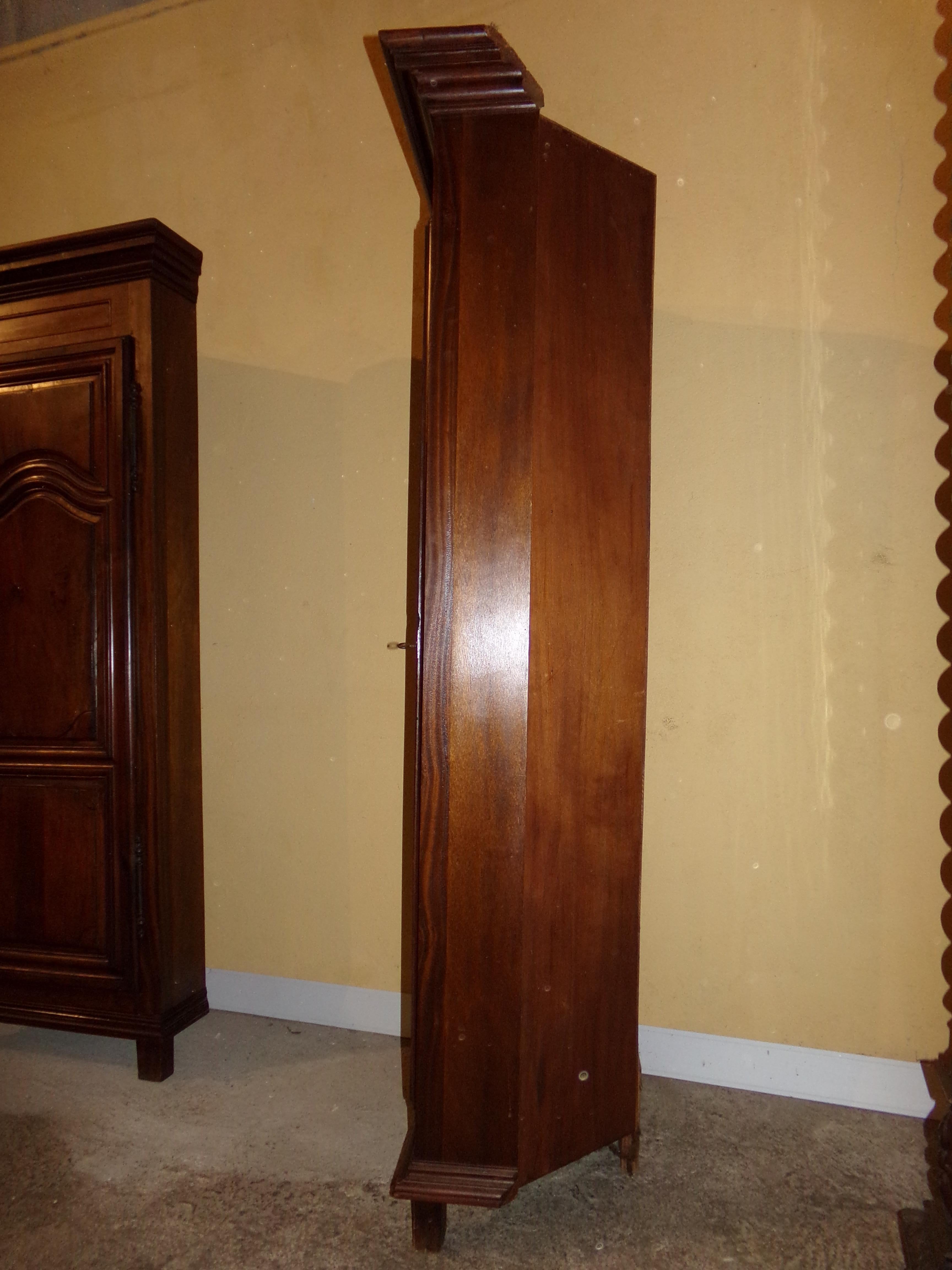 A good pair of essentially 18th century armoire corner cupboards circa 1790 this fine pair were modified by an excellent Ebeniste in the middle of the last century. Of good color and having a fine patination. Perfect for modern living.