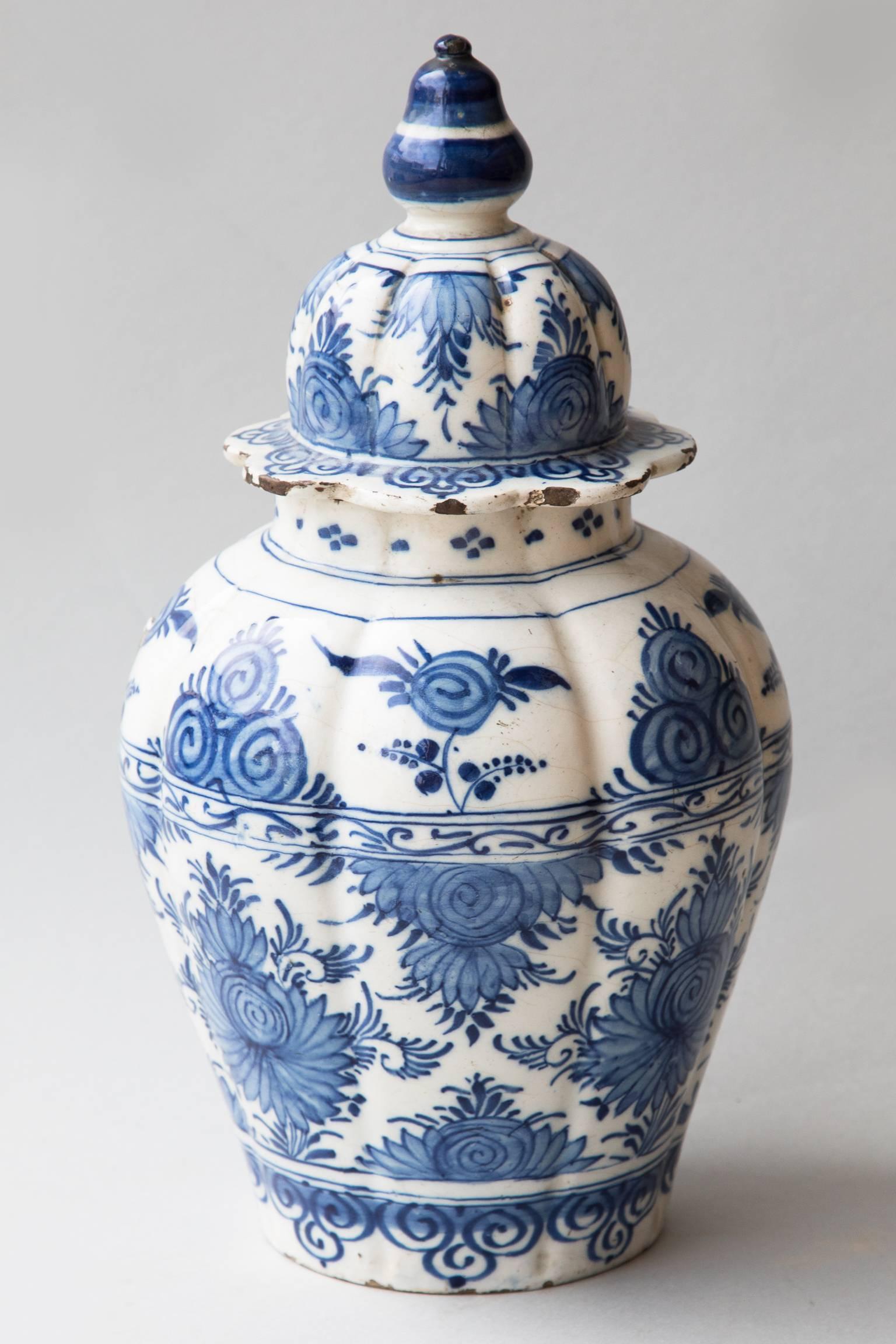 Dutch Pair of 18th Century Blue and White Faience Baluster Vases with Shaped Lids For Sale