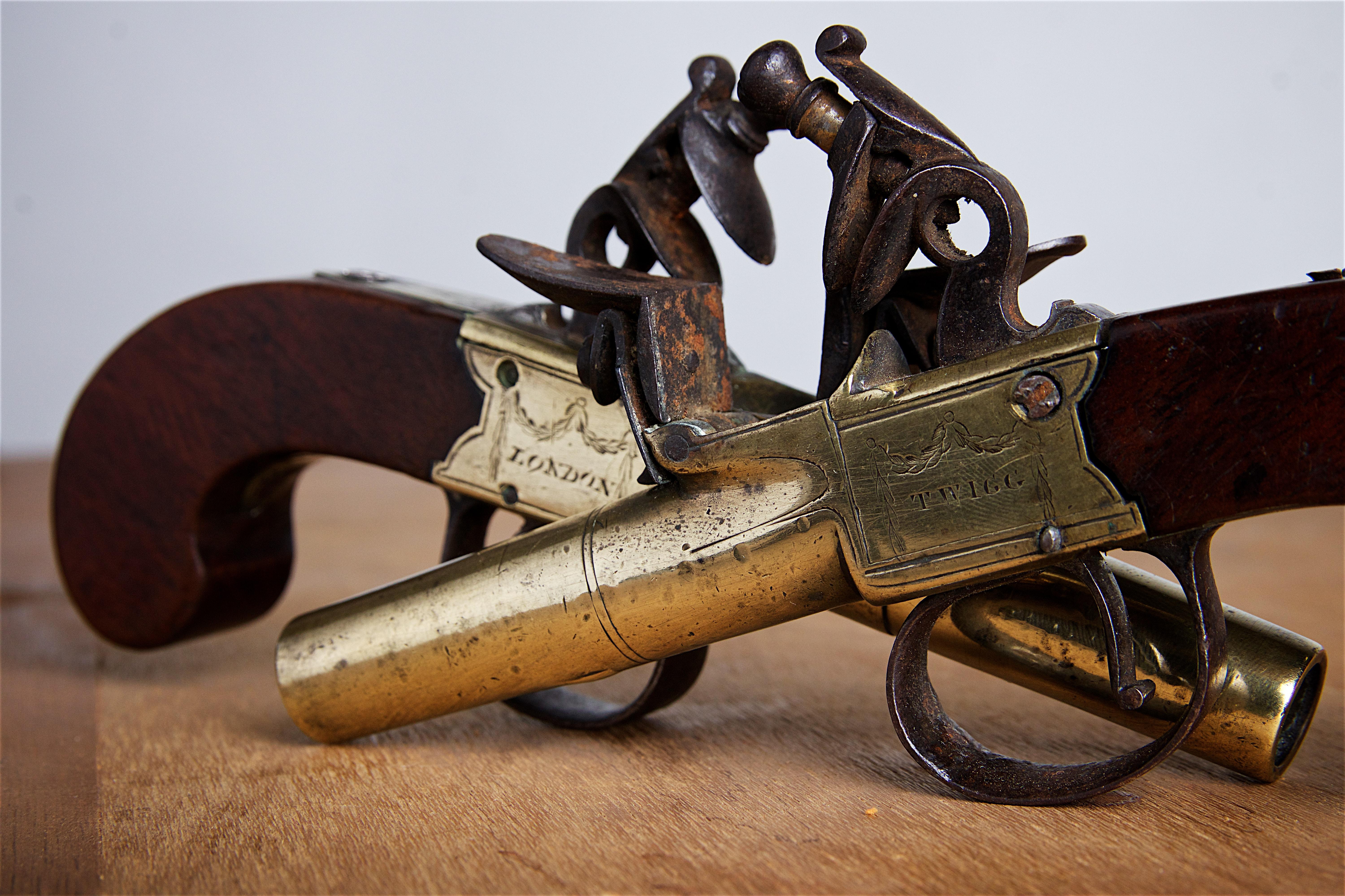 Pair of 18th Century Brass Pistols by John Twigg 1