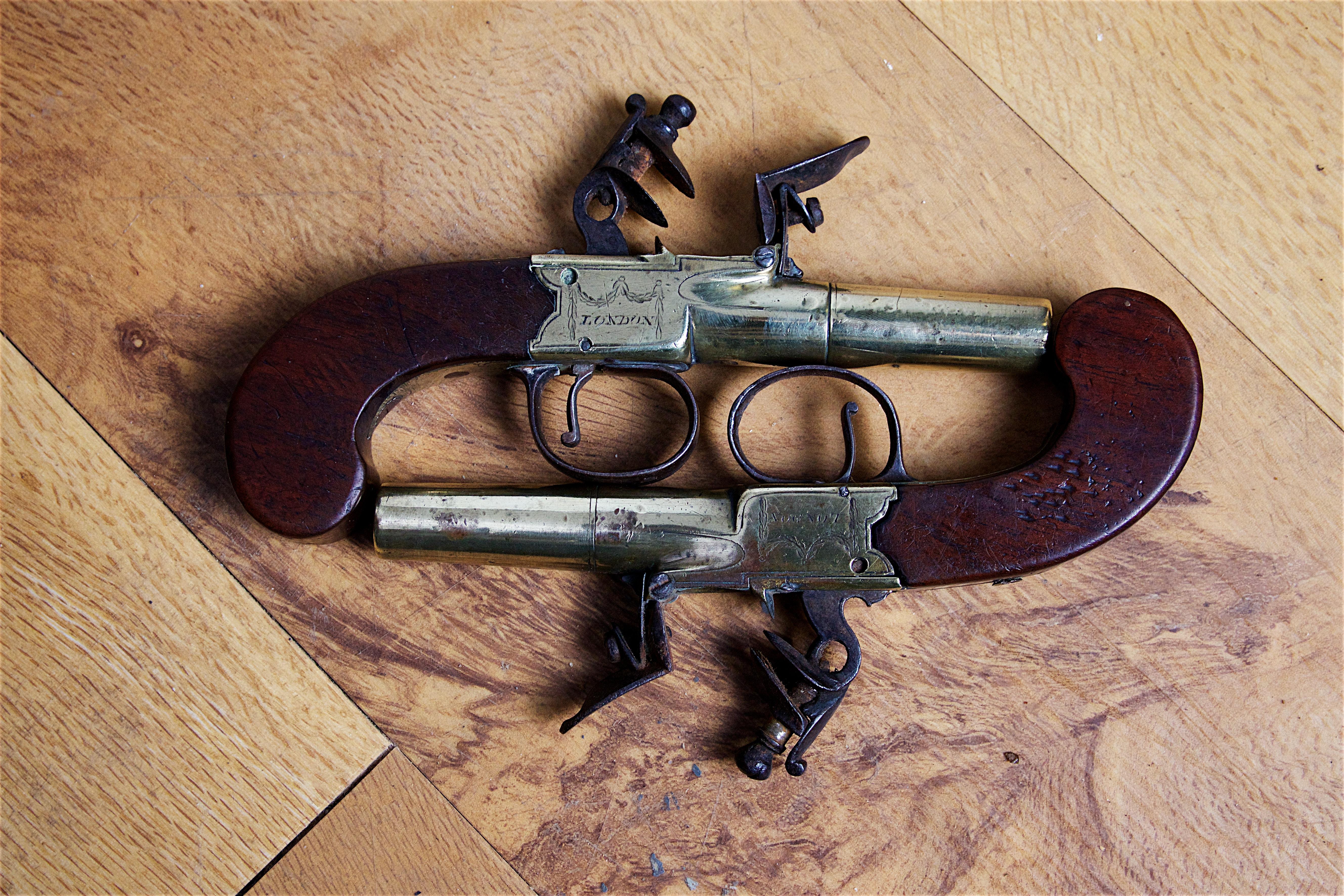 Pair of 18th Century Brass Pistols by John Twigg 2