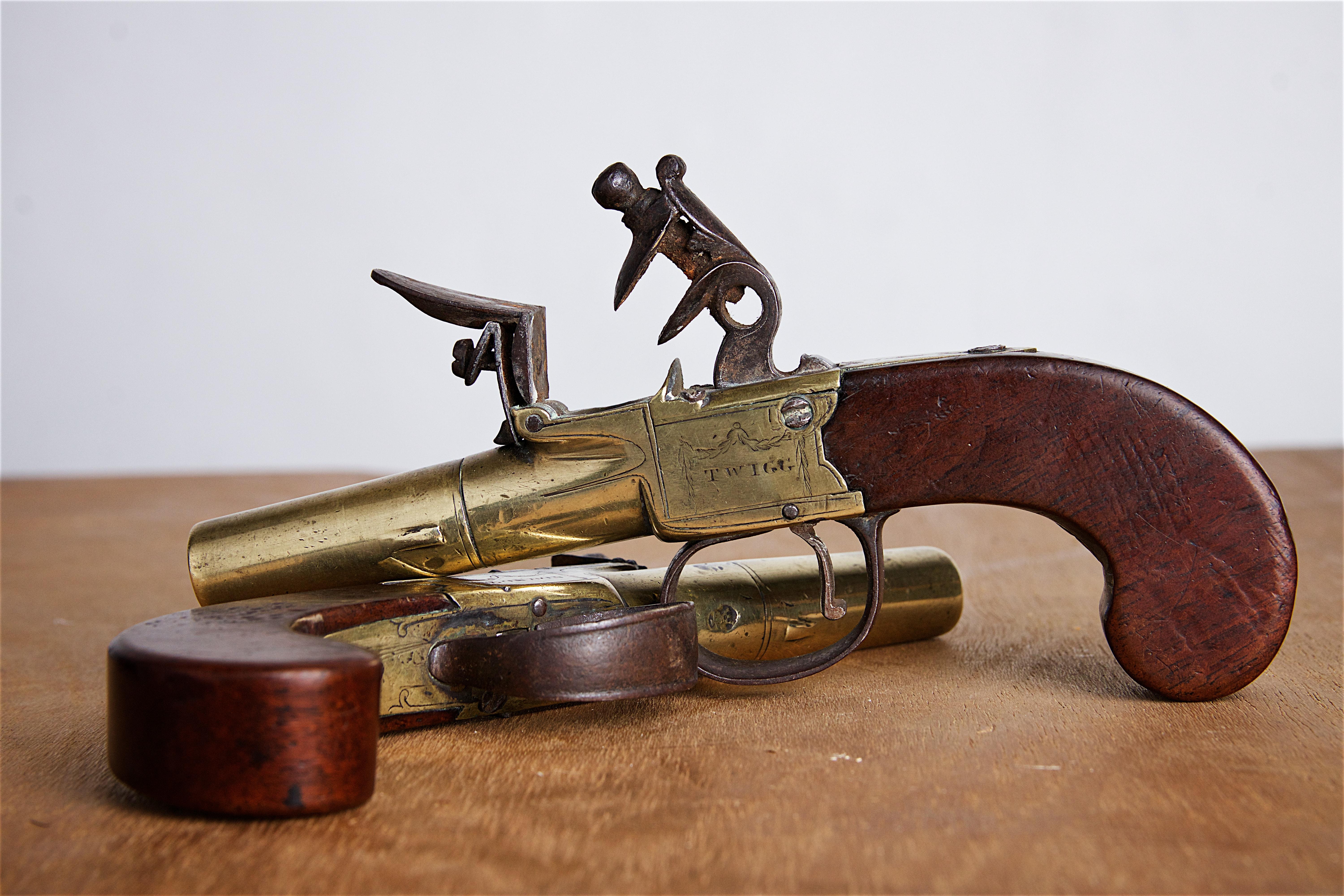 Pair of 18th Century Brass Pistols by John Twigg 4