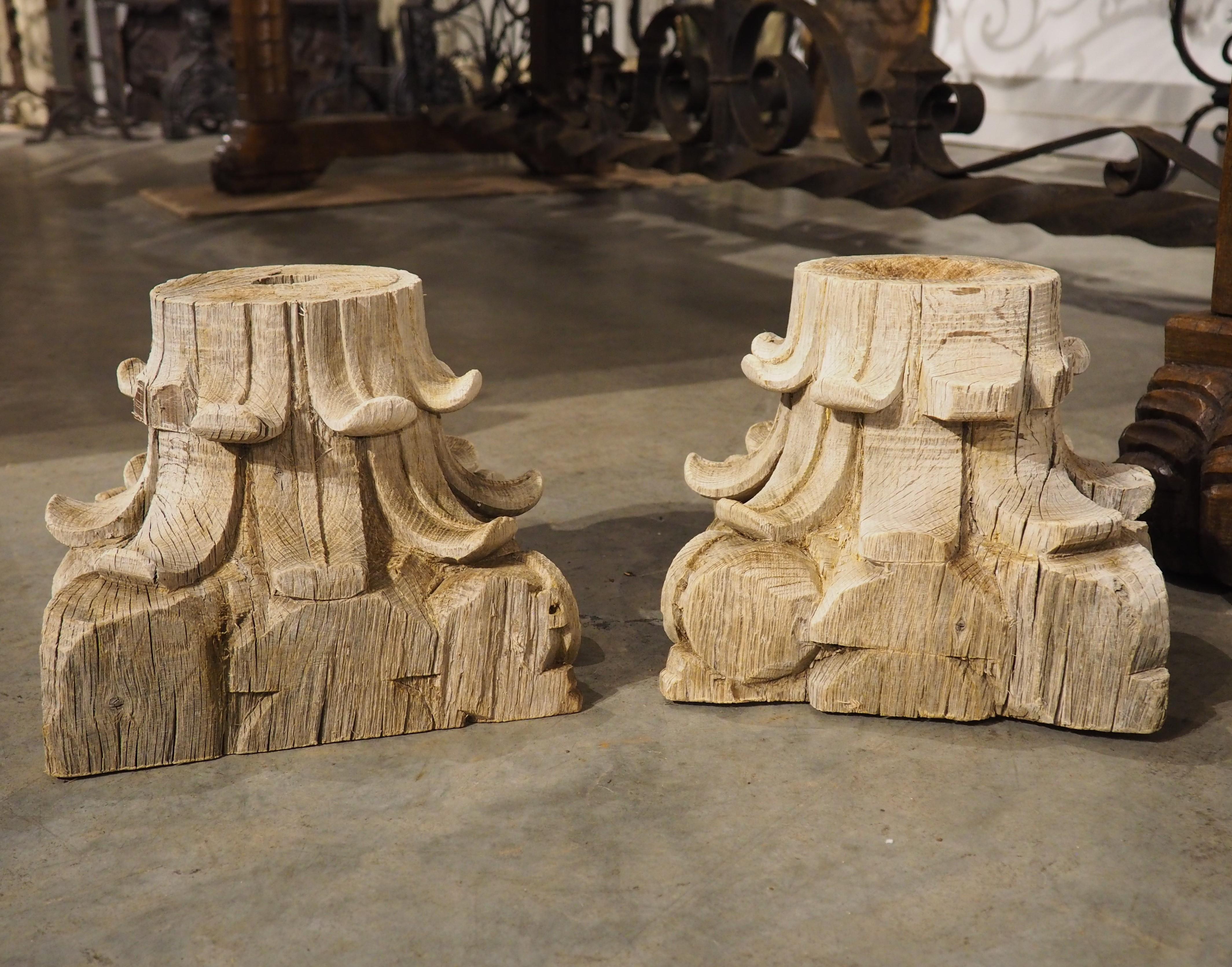 18th Century and Earlier Pair of 18th Century Carved and Weathered Oak Capitals from France