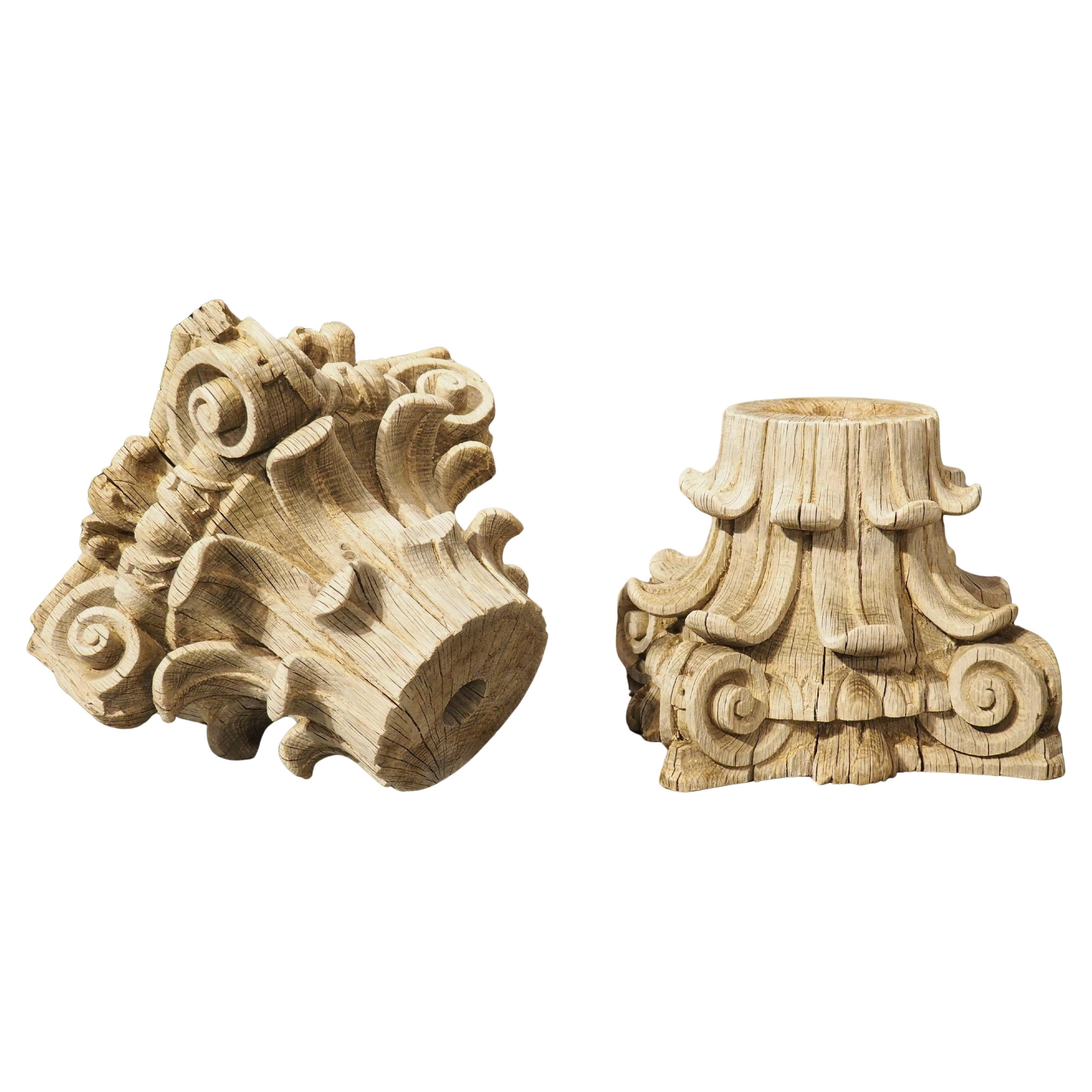 Pair of 18th Century Carved and Weathered Oak Capitals from France
