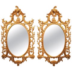 Pair of 18th Century Carved Oval Giltwood Mirrors