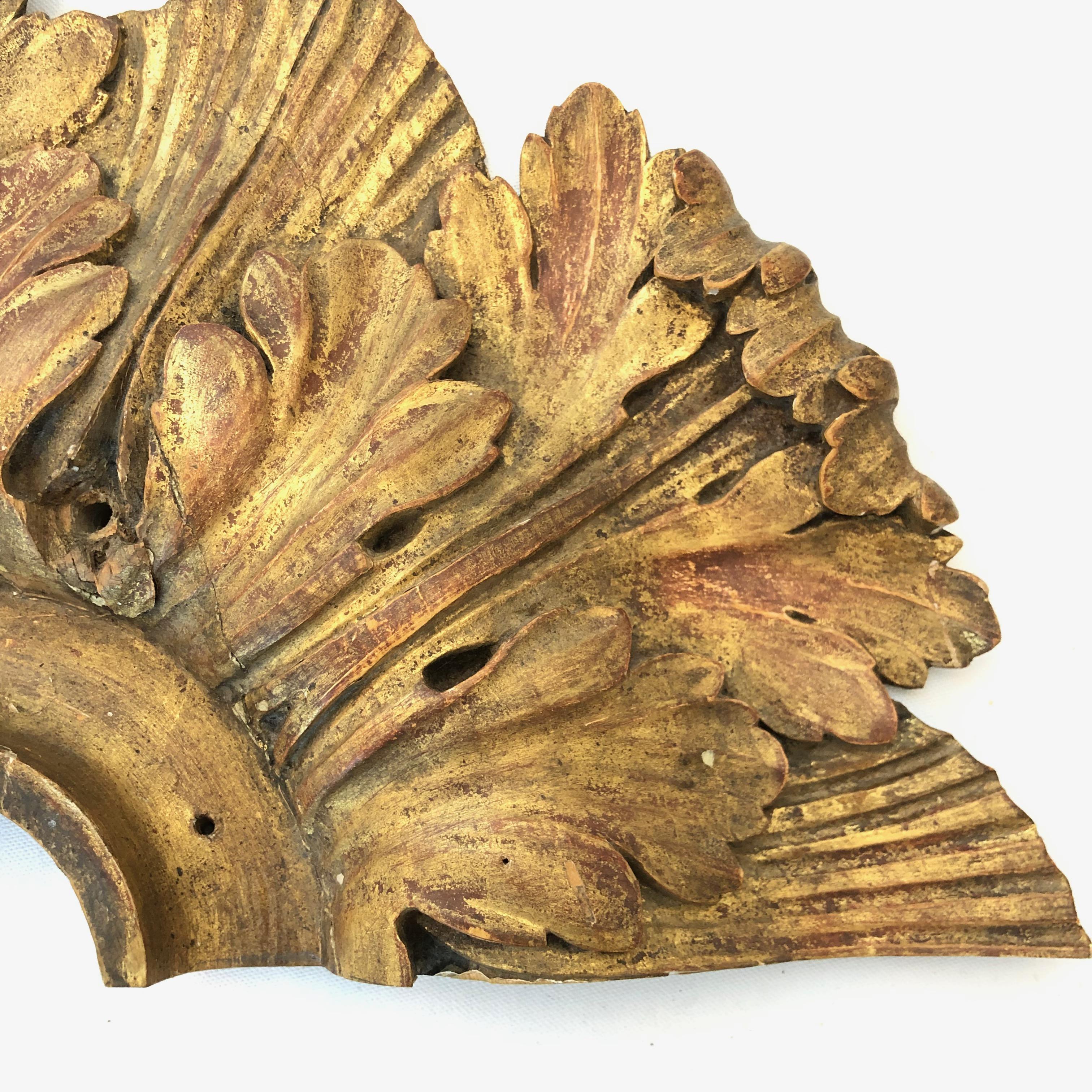 18th century carved wood gold leaf fan.