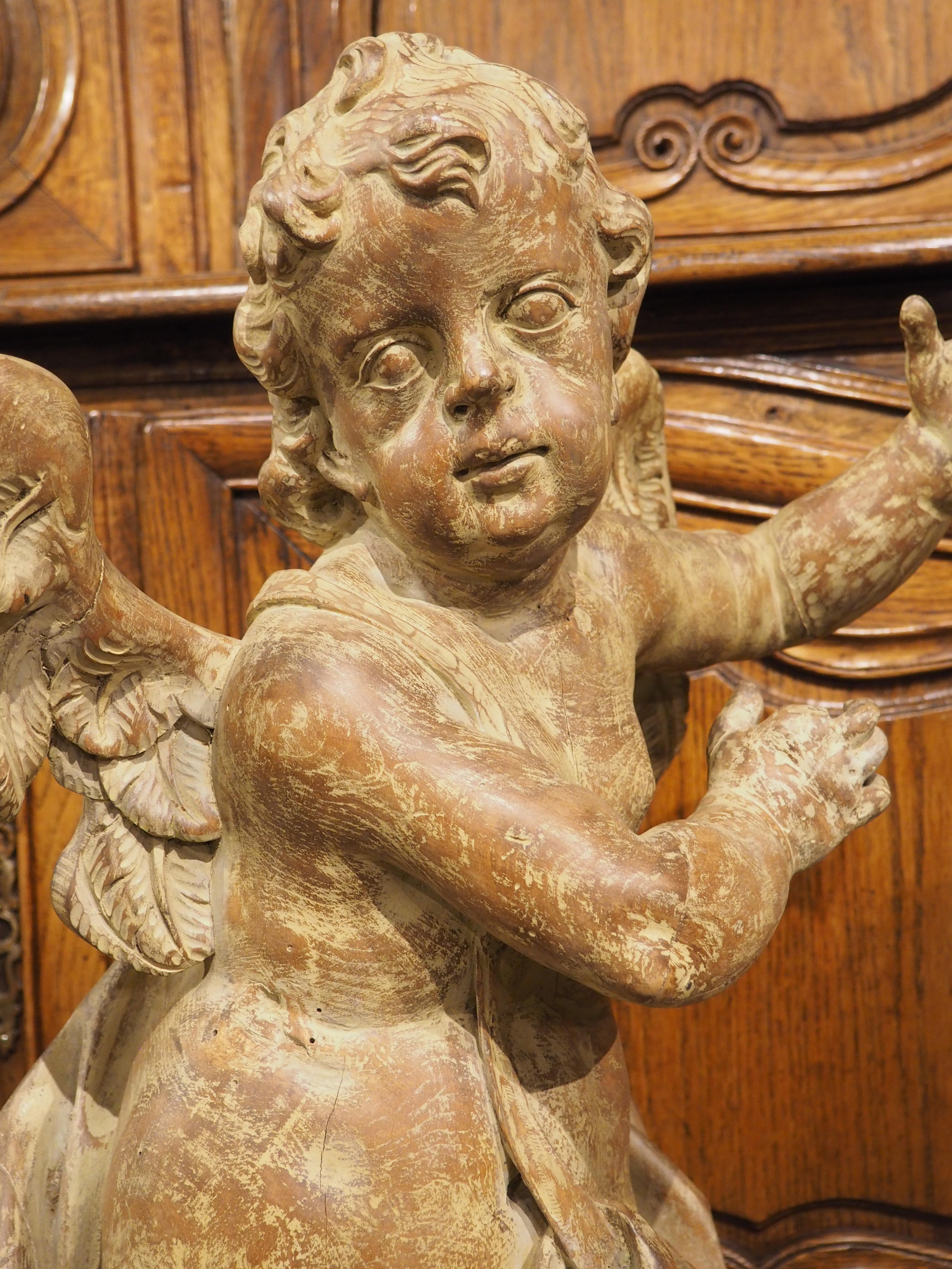 Pair of 18th Century Carved Wooden Winged Cherubs from Italy For Sale 8