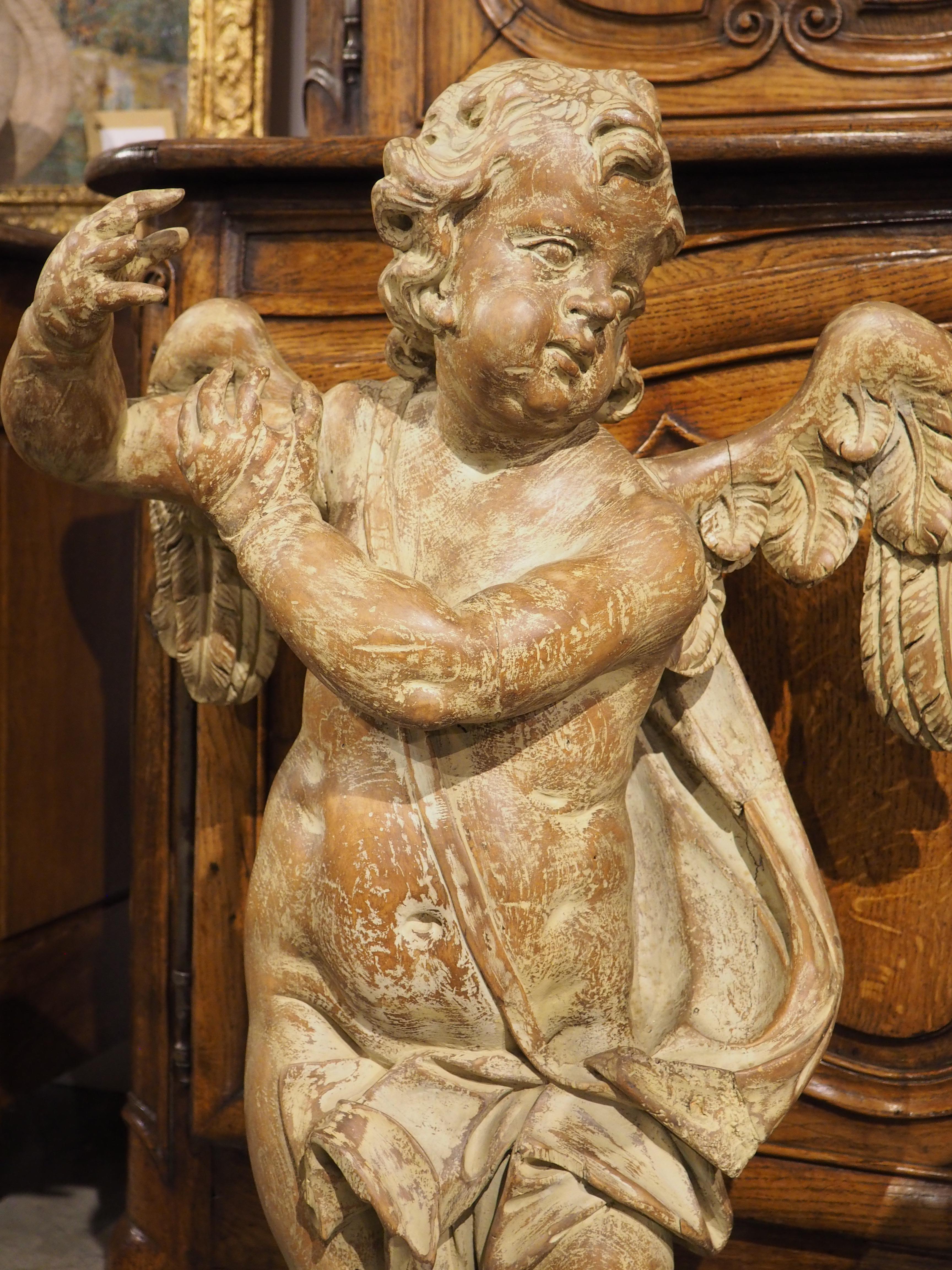Pair of 18th Century Carved Wooden Winged Cherubs from Italy For Sale 9
