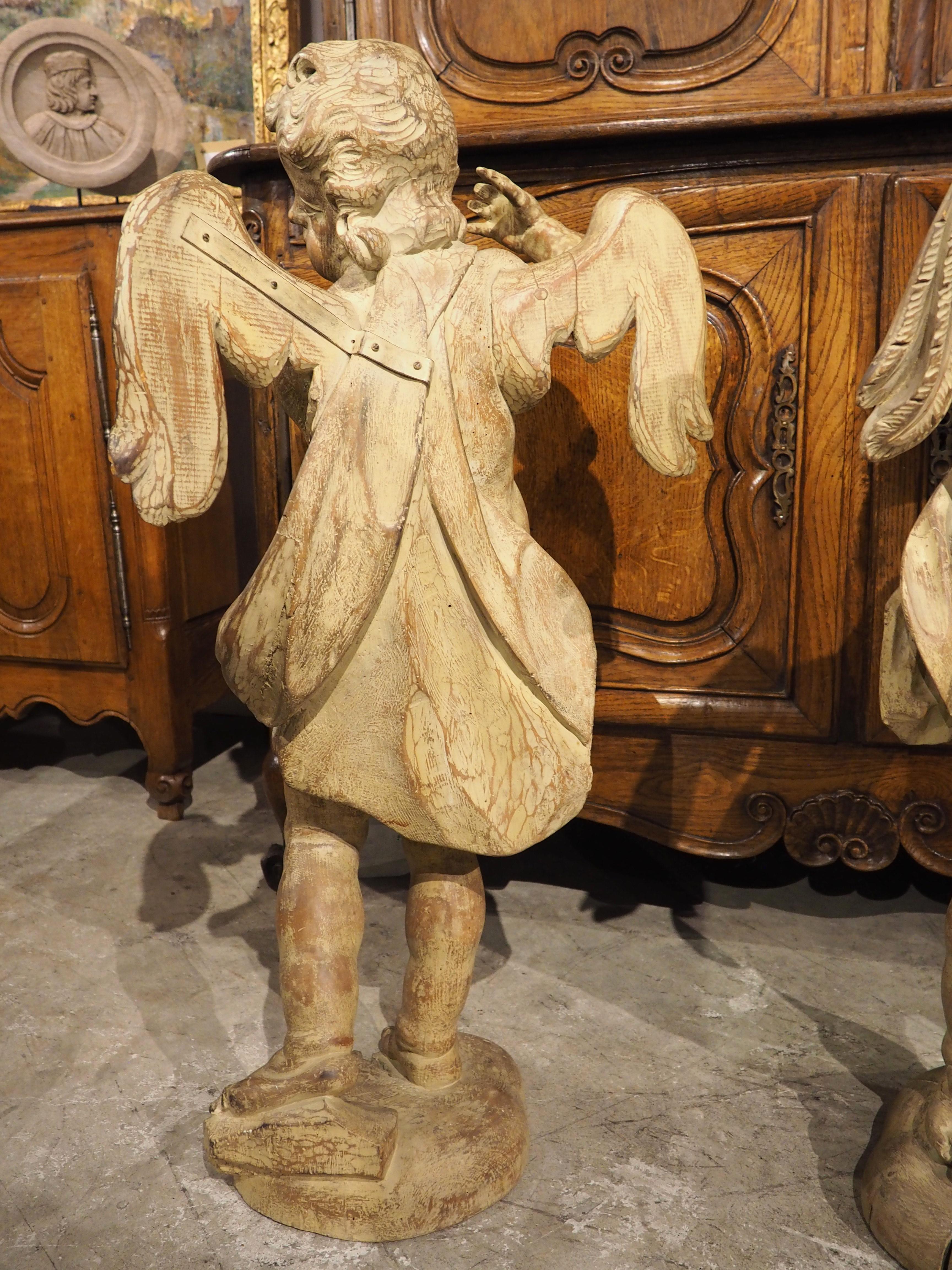 Pair of 18th Century Carved Wooden Winged Cherubs from Italy For Sale 10