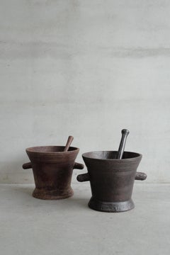 Pair of 18th Century Cast Iron Mortars with pestle