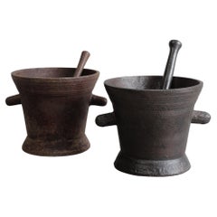 Pair of 18th Century Cast Iron Mortars with pestle