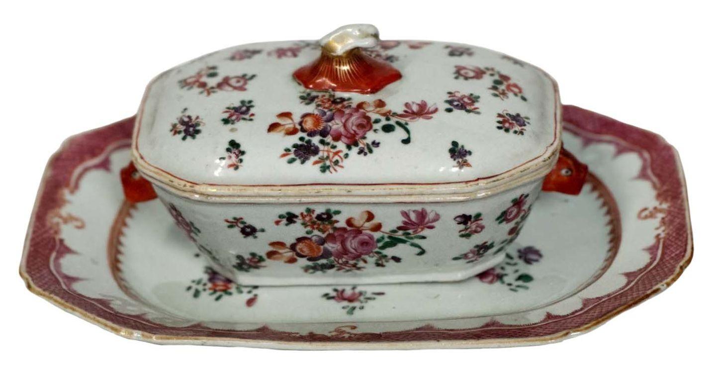 Pair of Chinese Export Famille Rose porcelain sauce tureens, each having a unique cover design and matching platters. They depict beautiful flower motif and red boar head handles. Made in England in the late 18th Century.
Dimensions:
3.5