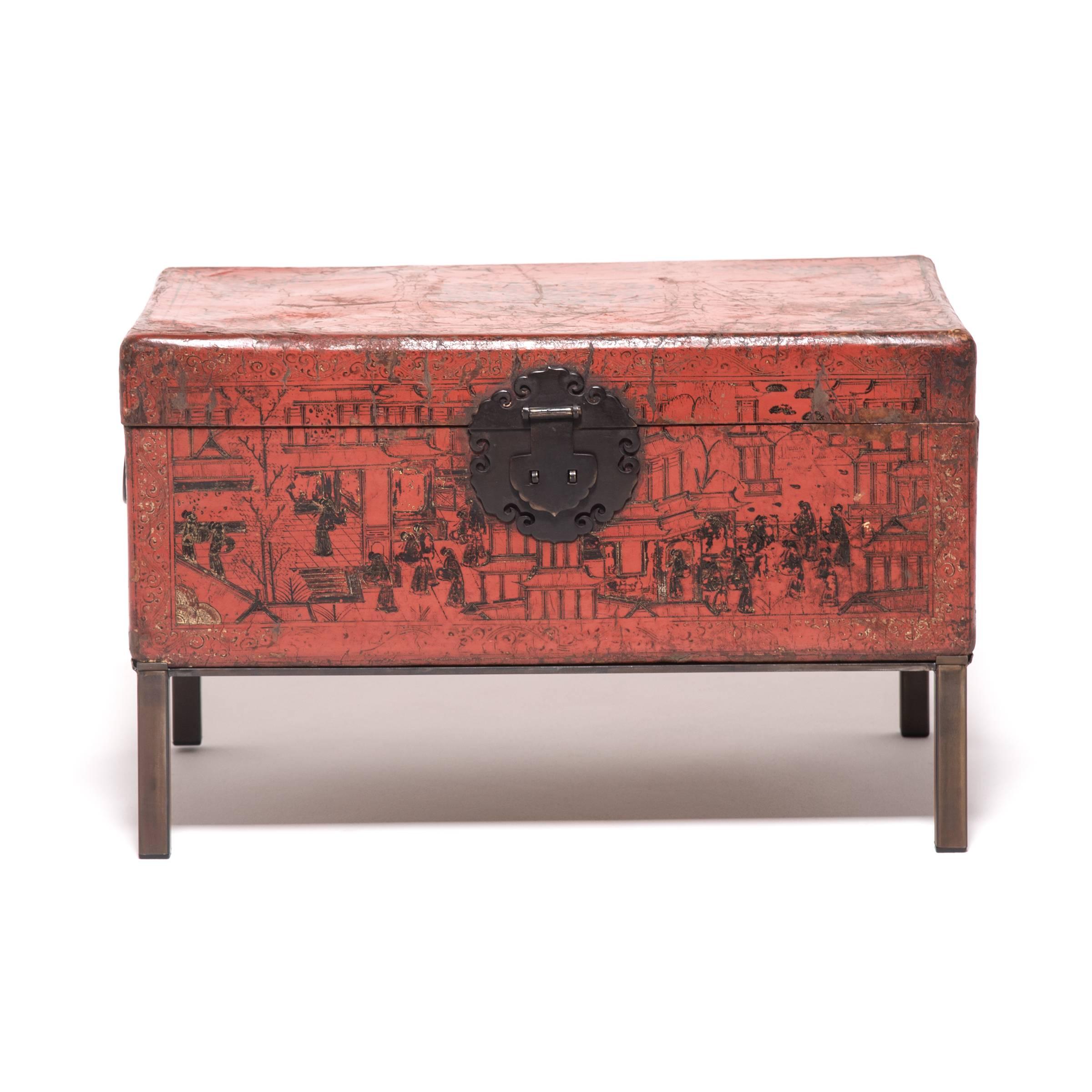 For over 250 years—through many turbulent years of Chinese history—this pair of red lacquered trunks has remained together. They each have their original brass hardware and are made of hide lacquered in a brilliant red, which has cracked and worn