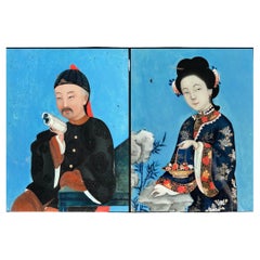 Paire de portraits chinois en verre inversé du 18ème siècle 