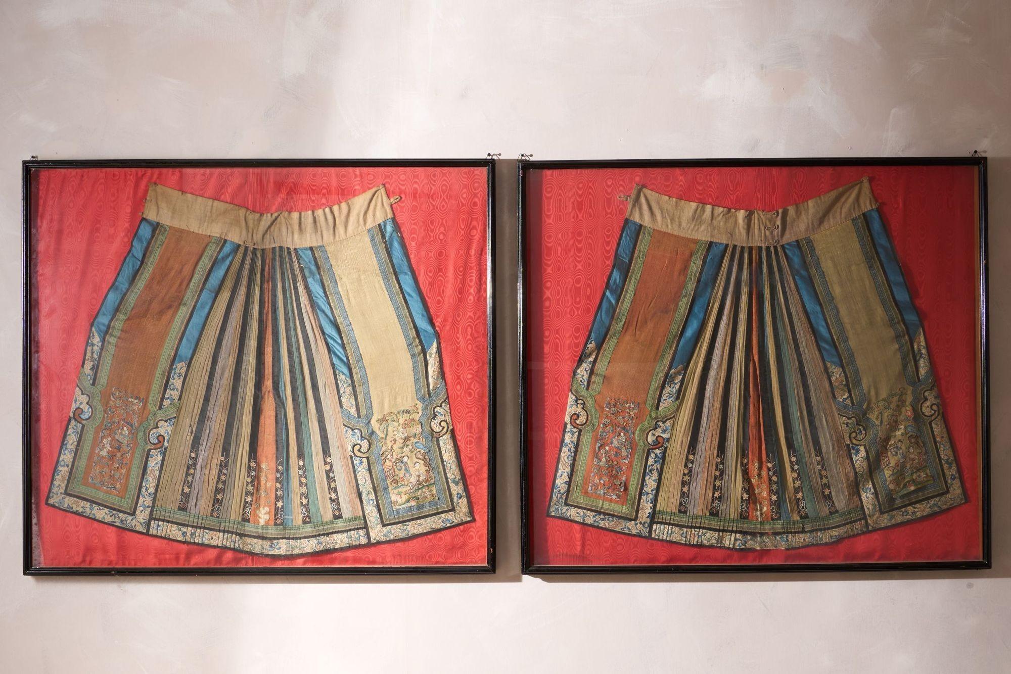 These are a stunning and rare pair of framed 18th century Chinese silk ceremonial dresses. The amount of detail is incredible with very fine figures and birds amongst tress. The condition of these is very good with clean bold colours and near