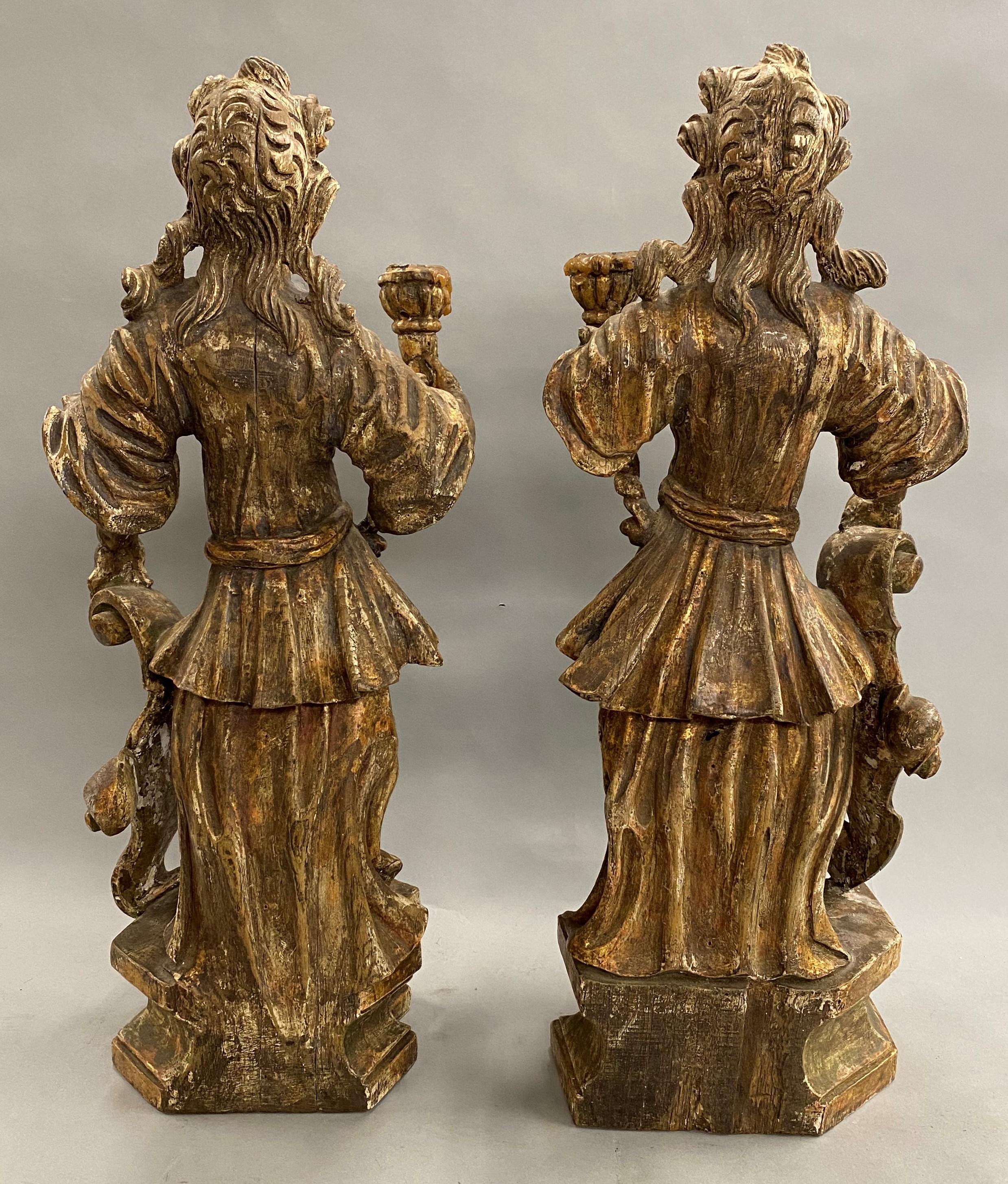 Hand-Carved Pair of 18th Century Continental Figural Carved Polychrome & Gilt Candle Holders For Sale