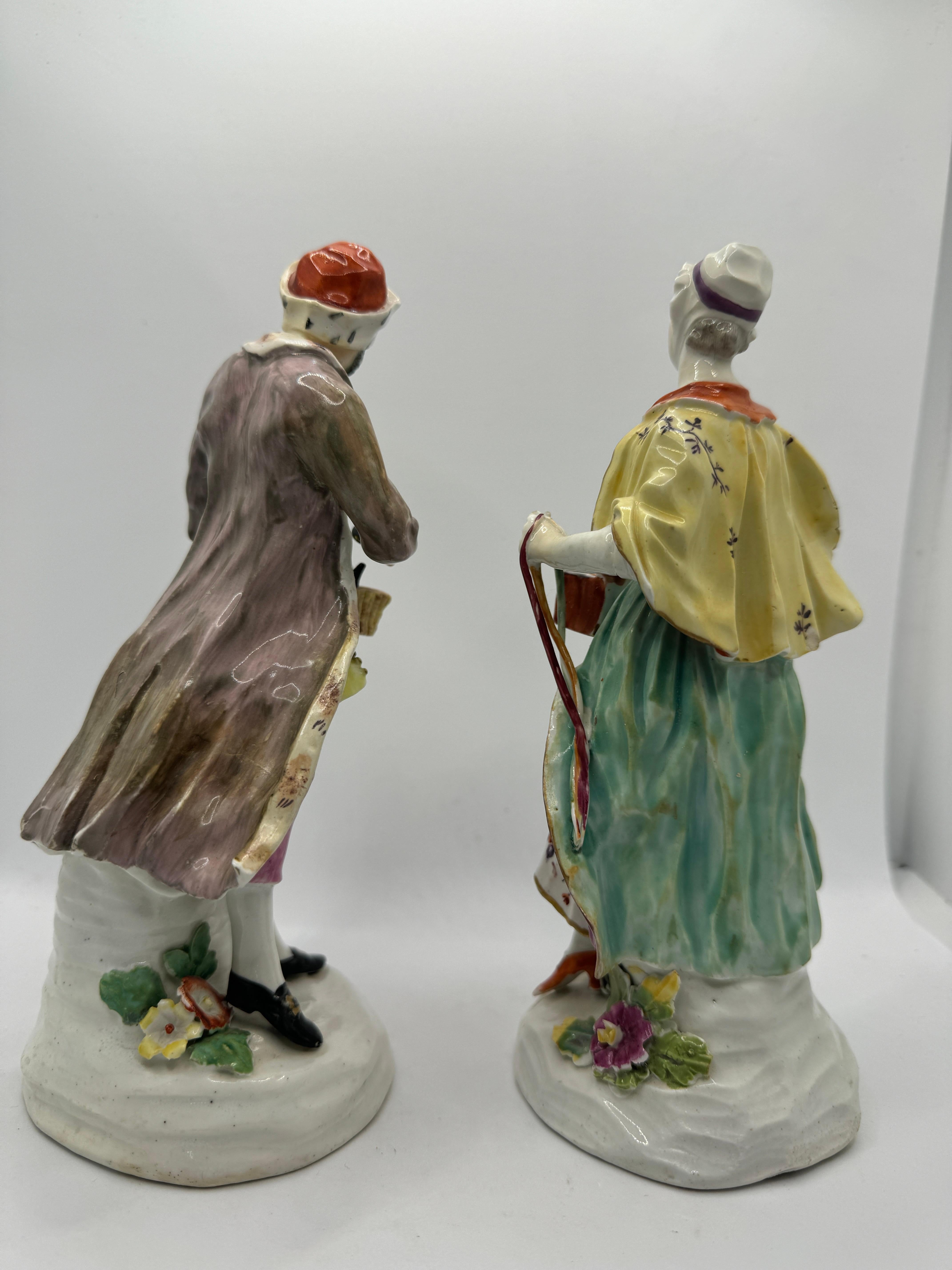 Hand-Painted Pair of 18th Century Derby Figures of 'Jewish Pedlar and Companion' , circa 1760 For Sale