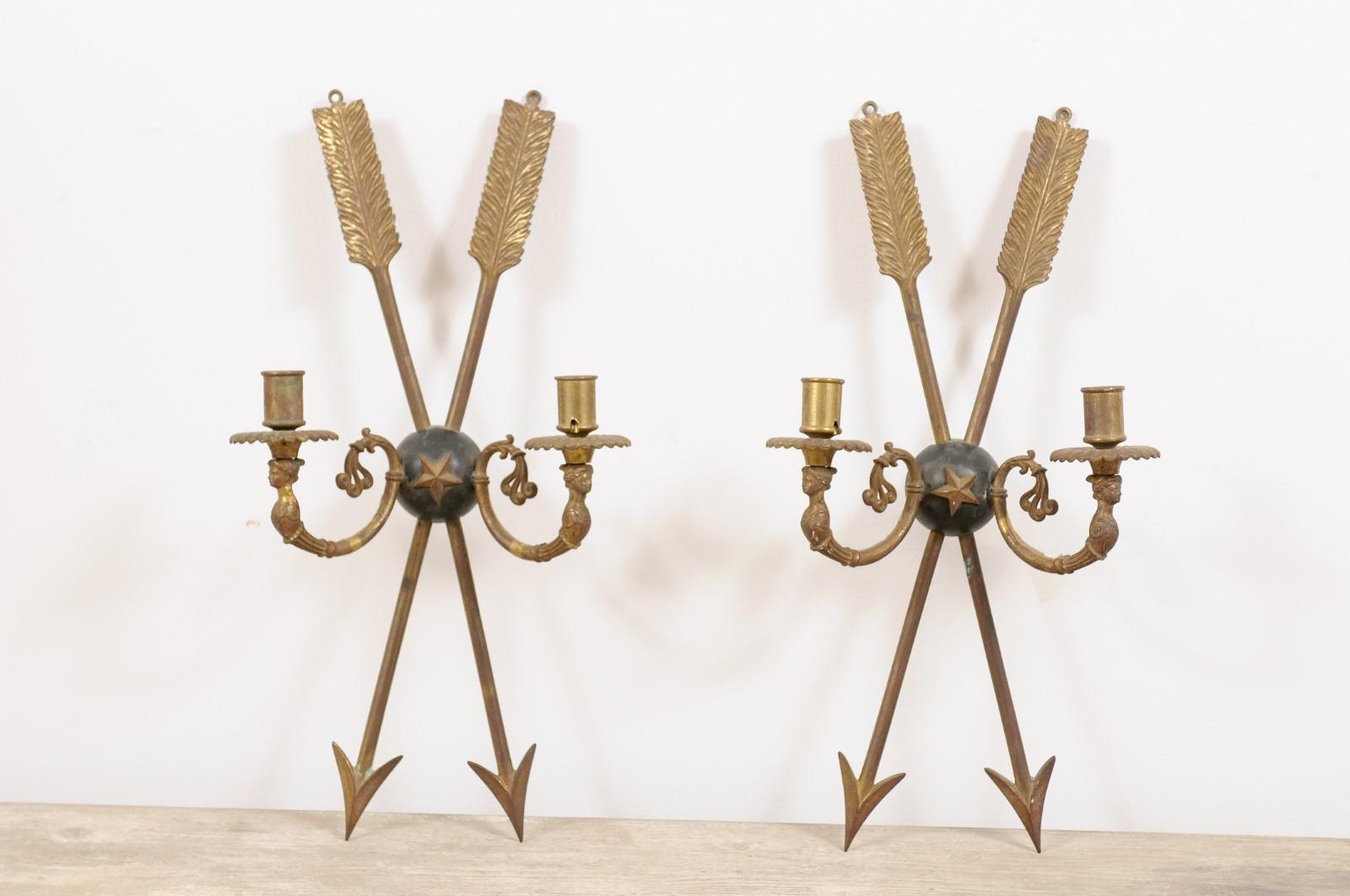 Why we love them: This pair of exquisite 18th century. Directoire brass sconces had us at 