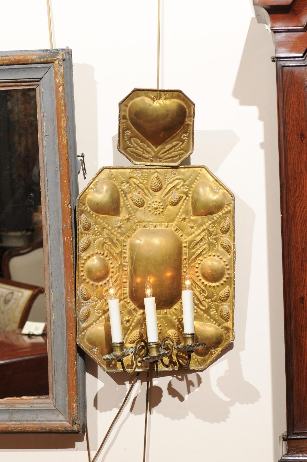Pair of 18th century Dutch brass sconces with heart decoration & 3 lights.
