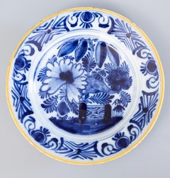 Pair of 18th Century Dutch Delft Faience Floral Plates