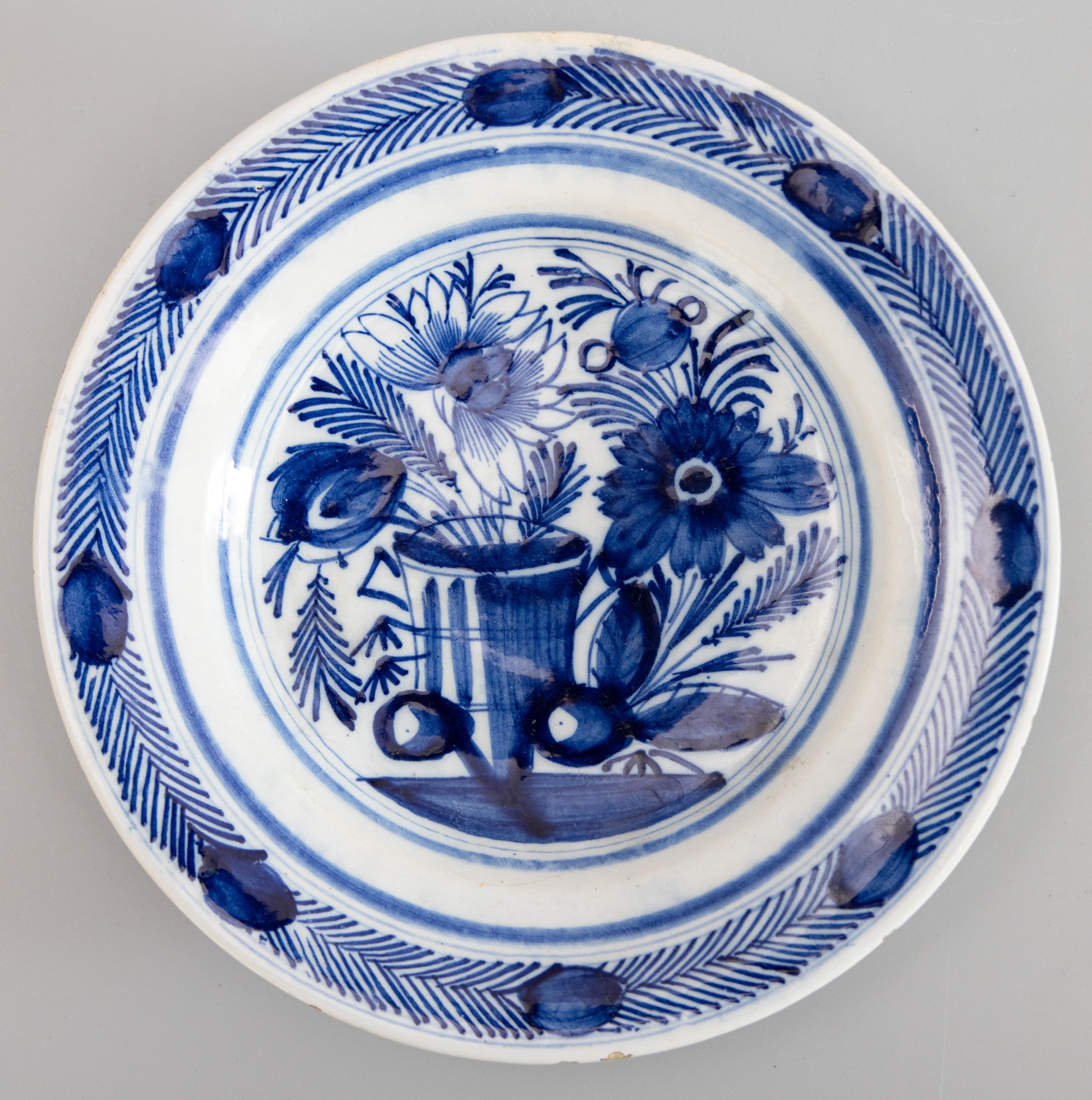 18th Century and Earlier Pair of 18th Century Dutch Delft Faience Floral Plates For Sale