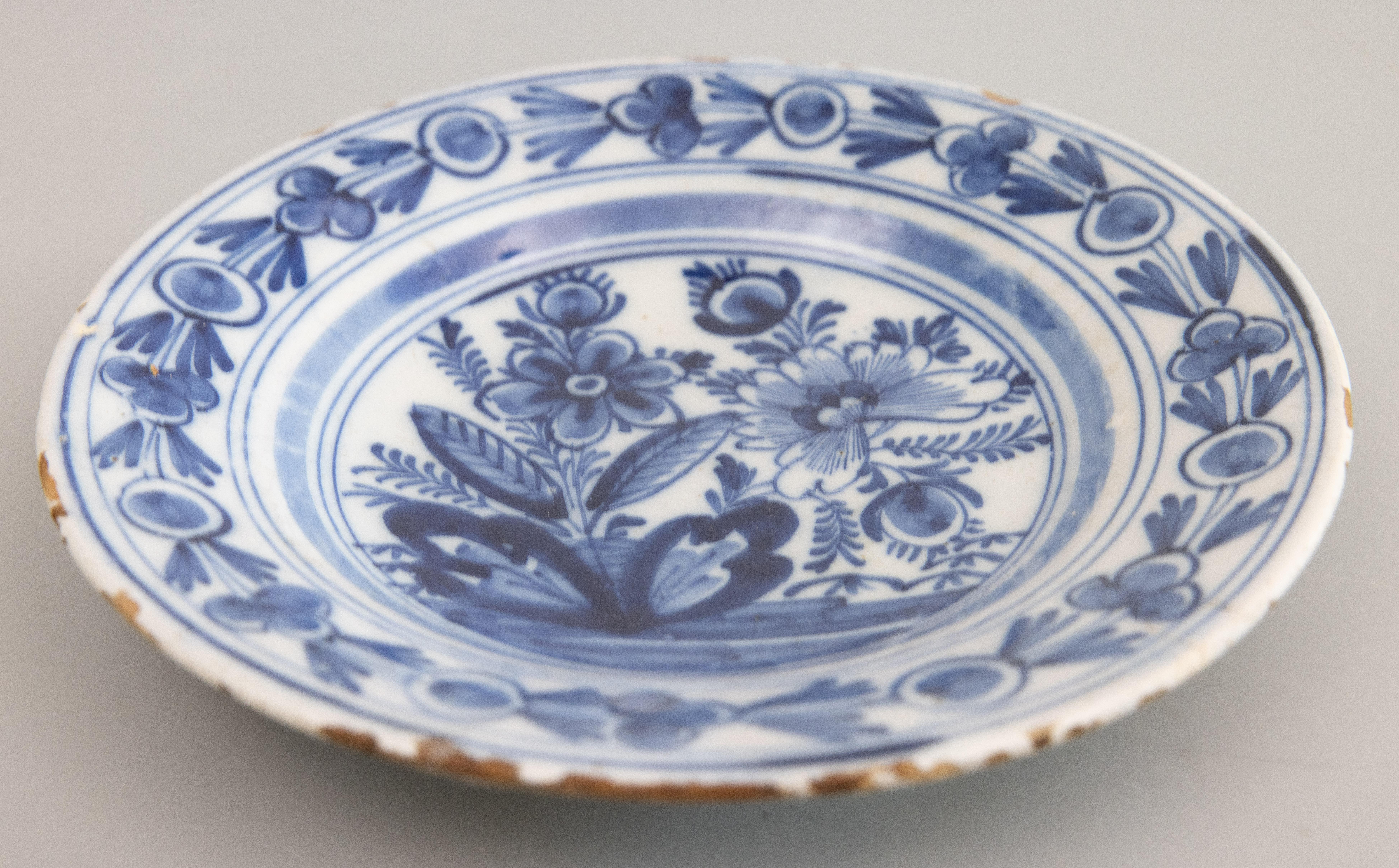 Pair of 18th Century Dutch Delft Faience Floral Plates For Sale 4