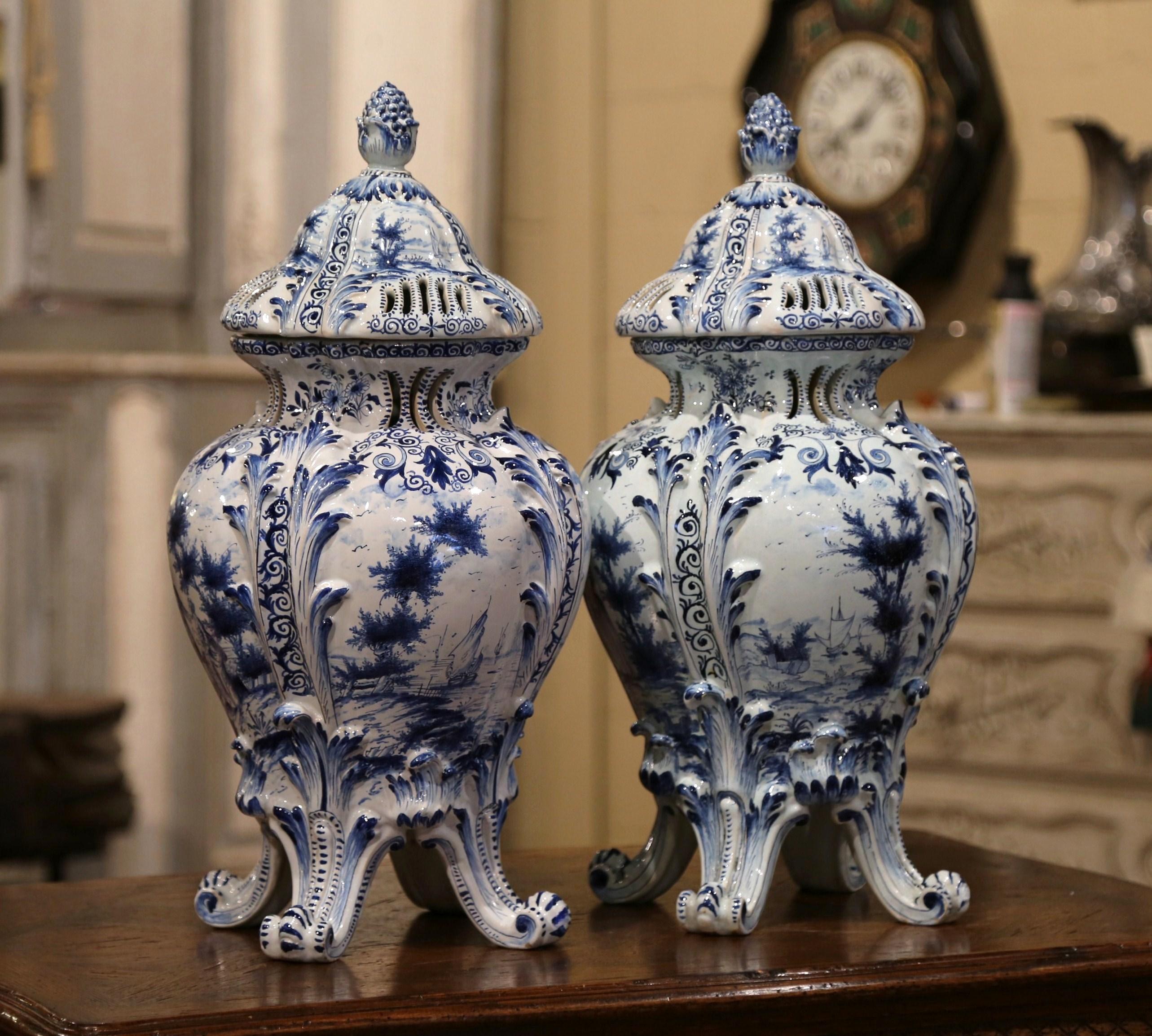 These important antique vases in the Louis XV style were crafted in France, circa 1780. Raised on scrolling feet decorated with acanthus leaves on the shoulders, the elegant tureens are round in shape with a pierced neck, each large vessel features
